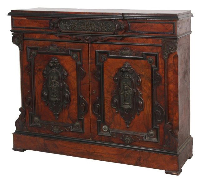 Allen Bros. Carved Walnut Credenza: Allen Bros. Carved Walnut Credenza. Elaborate grained burled walnut 2 door cabinet with fancy carvings and trim; single drawer with relief molded brass plaque and figural putti, the door fronts have r