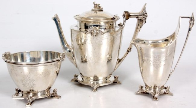 Gorham Sterling Sphinx Tea Set: 3 Pc. Gorham Sterling Sphinx Tea Set. Tea pot, creamer and bowl; each on a round platform base with 4 figural wings sphinx feet, sphinx finial on the lid, heads on the handles and faces with rosettes 