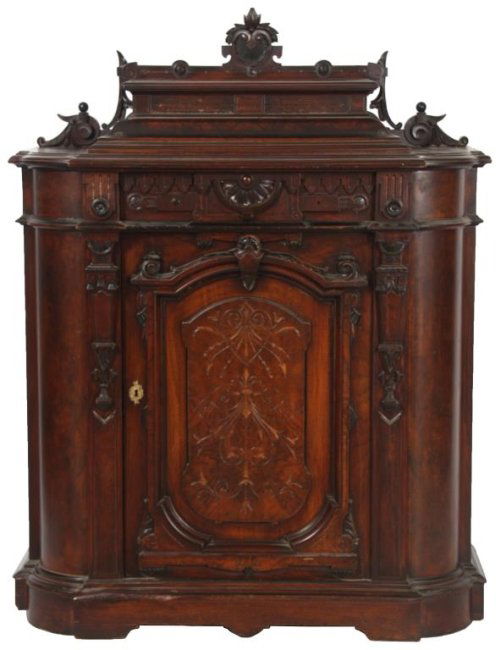 Carved Walnut 1 Door Credenza: Carved Walnut 1 Door Credenza. Carved crest with shell and filigree design, single door under a single drawer with carved & burled panel fronts having gilt incising and rounded corners. Split in the t
