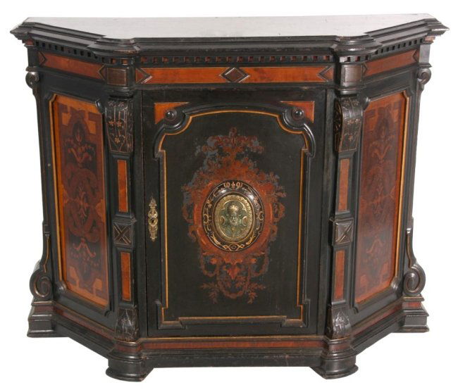 Ebonized & Inlaid Renaissance Credenza: Ebonized & Inlaid Renaissance Revival Credenza. One door ebonized cabinet with fancy inlaid angled side panels, carved and incised pillasters on the corners, inlaid door panel is centered with an oval