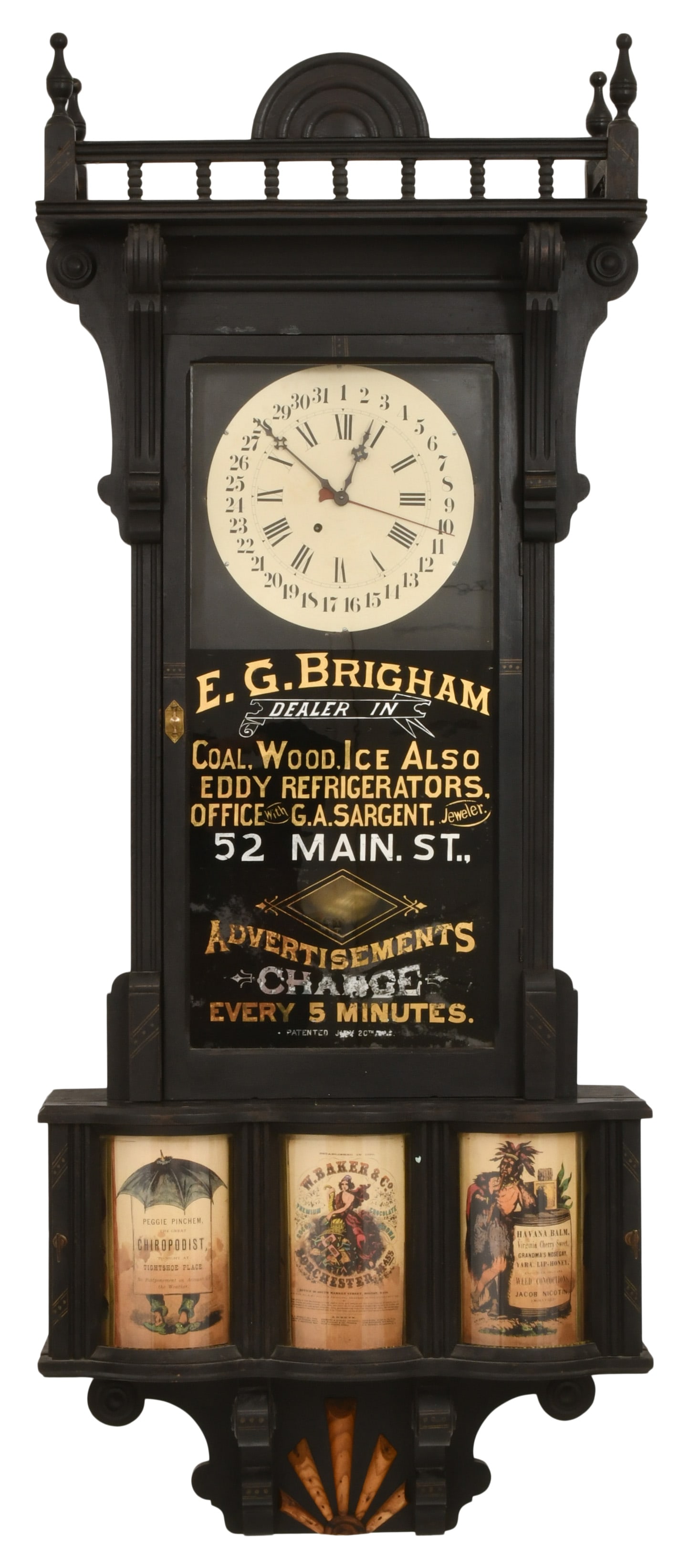 Sidney Advertising Clock Co., A Rare Advertising Wall Clock: Sidney Advertising Clock Co., A Rare Advertising Wall Clocklate 19th centurythe Eastlake style case with lower advertising rolls that change every 5 minutes with a bell sounding, 8-day brass time only