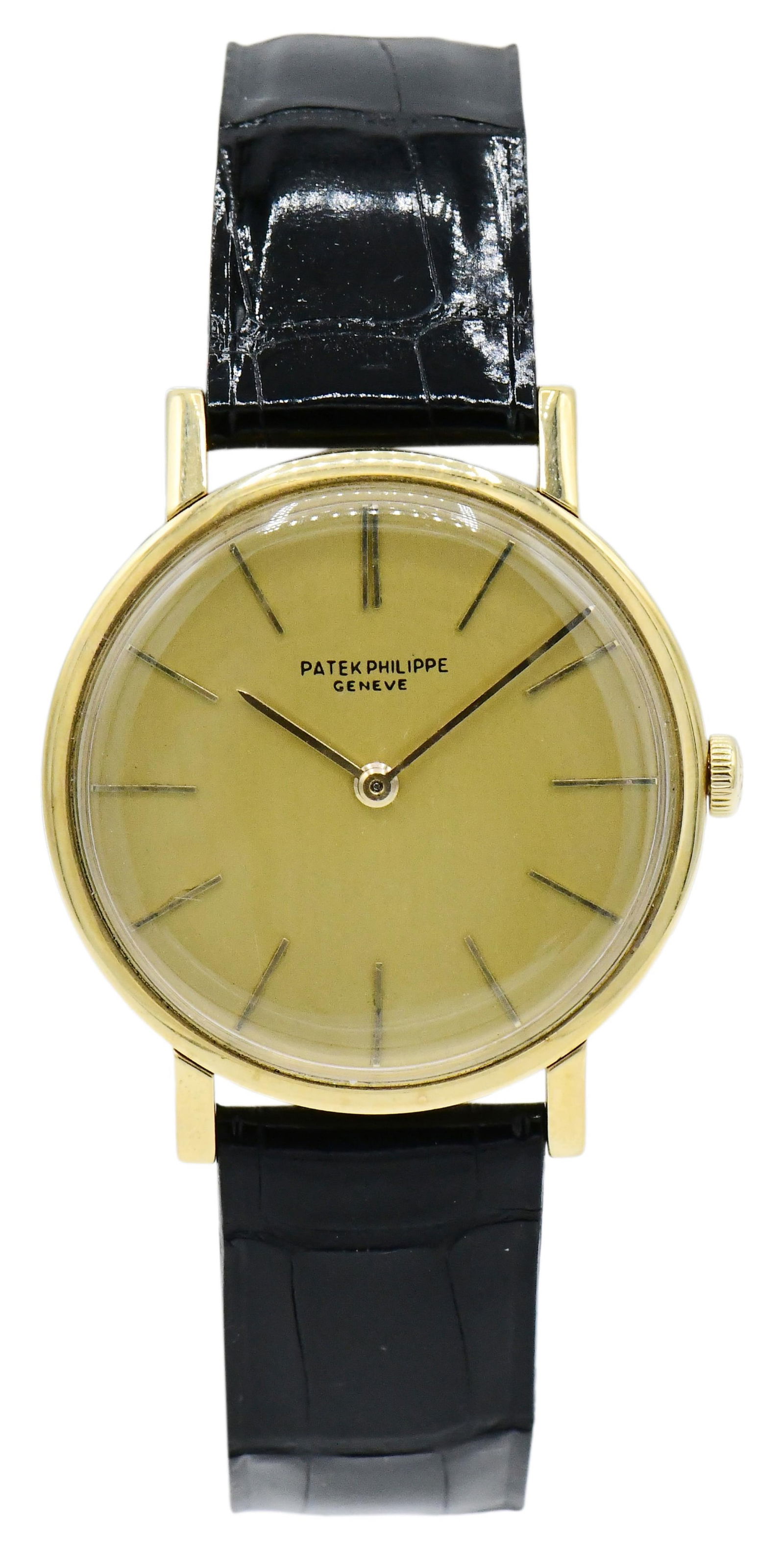 Patek Philippe 18K Gold Calatrava Wristwatch: Patek Philippe 18K Gold Calatrava WristwatchCase: 18K GoldCase Size: 32mmDial: ChampagneMovement: ManualDial Signed: "Patek Philippe, Geneve"Other Notes: Fontaine's Auction Gallery can arrange shi