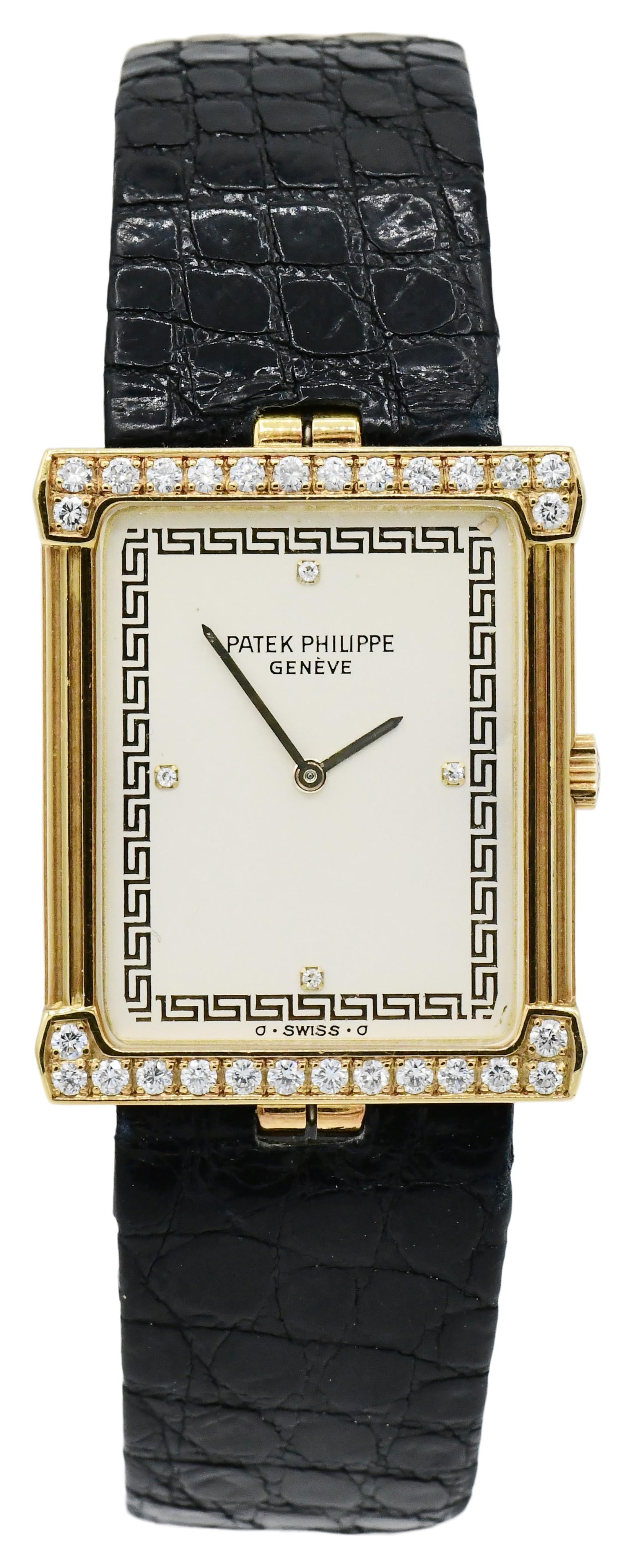Patek Philippe 18K Gold Les Grecques Wristwatch, Reference 4632/1, Circa 1984: Patek Philippe 18K Gold Les Grecques Wristwatch, Reference 4632/1, Circa 1984Case: 18K Gold, diamond-setCase Width: 25mmDial: White with gold Greek design on border, diamond-set numeralsBuckle/Clasp: