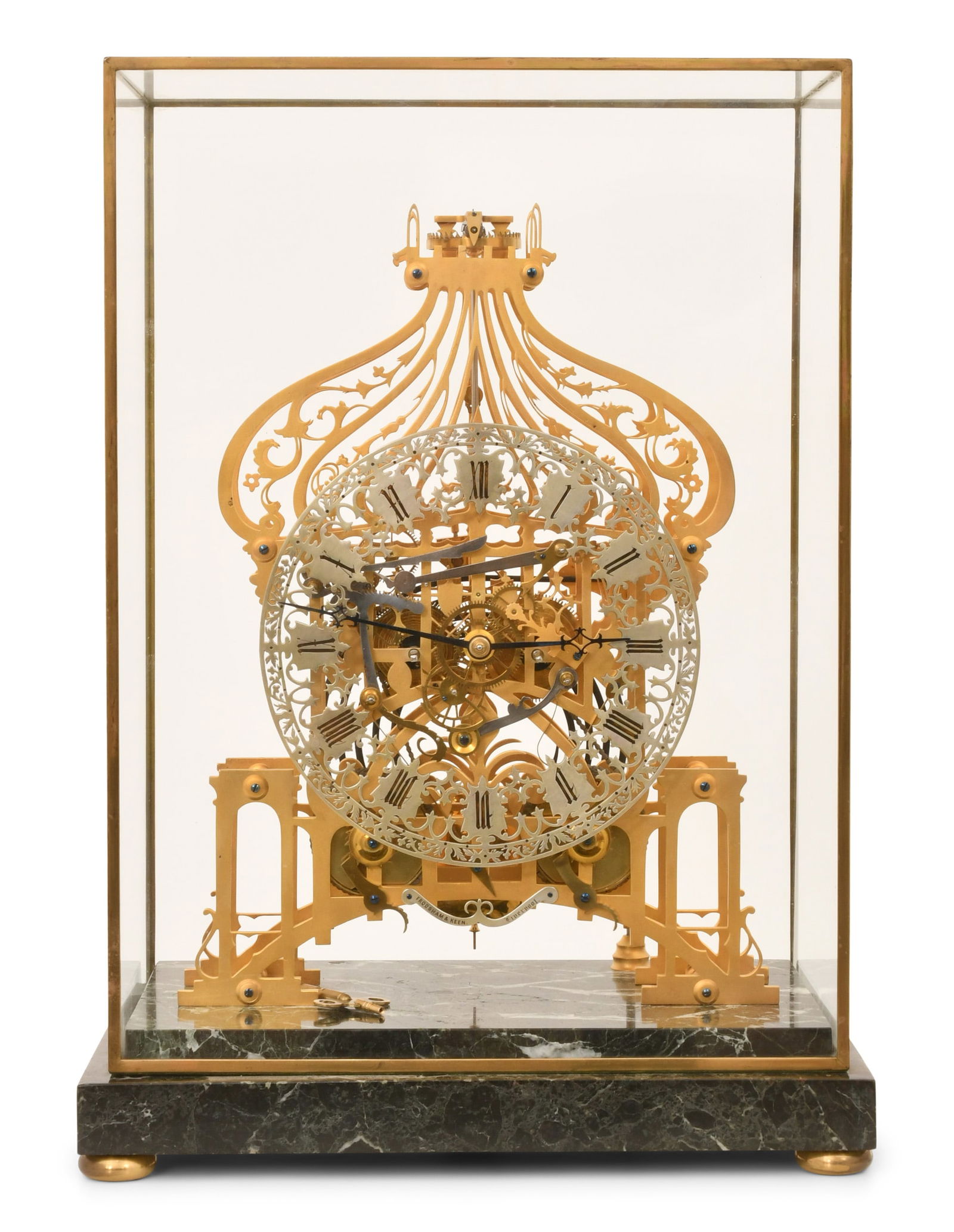 Frodsham & Keen, Liverpool, Pavilion Skeleton Clock: Frodsham & Keen, Liverpool, Pavilion Skeleton Clockearly 20th centurybrass skeleton plates in the form of the Brighton Pavilion on a green marble base with a glass cover, 8-day double fusee movement w