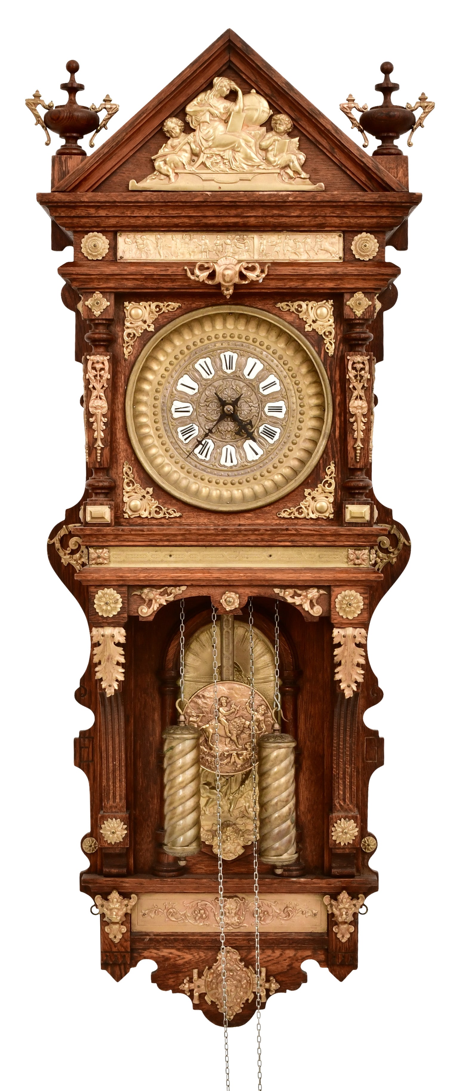 Ansonia Clock Co. "Antique Hanging" Wall Clock: Ansonia Clock Co. "Antique Hanging" Wall Clockcirca 1900oak case with turned finials and various brass mounts, back panel shows a maiden and a cherubbrass 8-day time and strike weight driven movement,