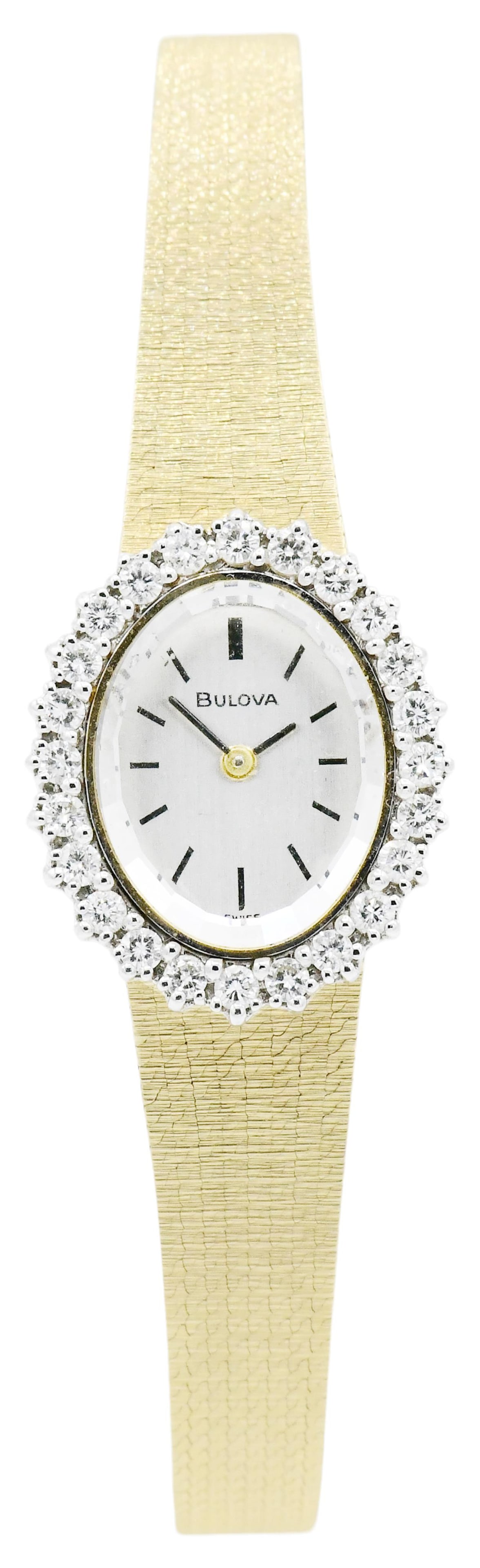 Bulova 14K Yellow Gold & Diamond Wristwatch: Bulova 14K Yellow Gold & Diamond WristwatchCase: 14K yellow gold, set with round brilliant diamonds weighing a total of 0.72 caratsCase Dimensions: 24 x 20 mmDial: silvered, baton hands and hour marke
