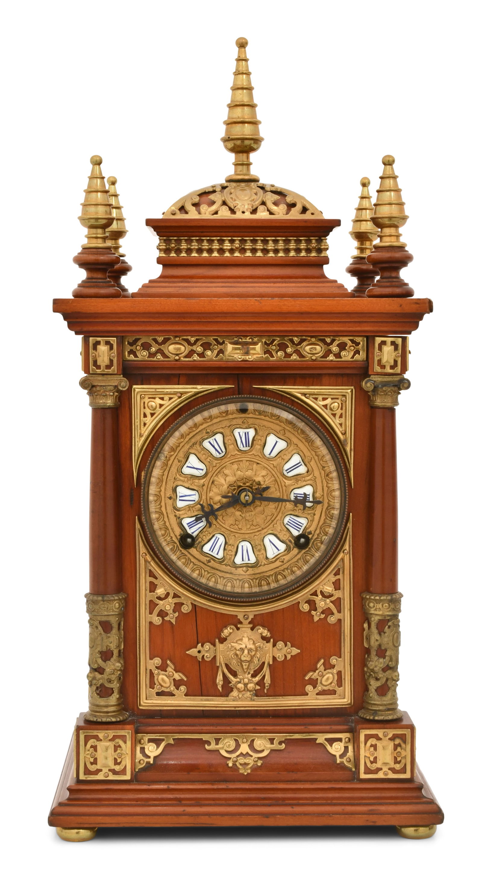 Ansonia Clock Co. "Cabinet Antique" Mahogany Mantel Clock: Ansonia Clock Co. "Cabinet Antique" Mahogany Mantel Clocklate 19th centurythe mahogany case with a domical top with brass spire finials and applied brass mounts throughout, fancy brass dial with carto