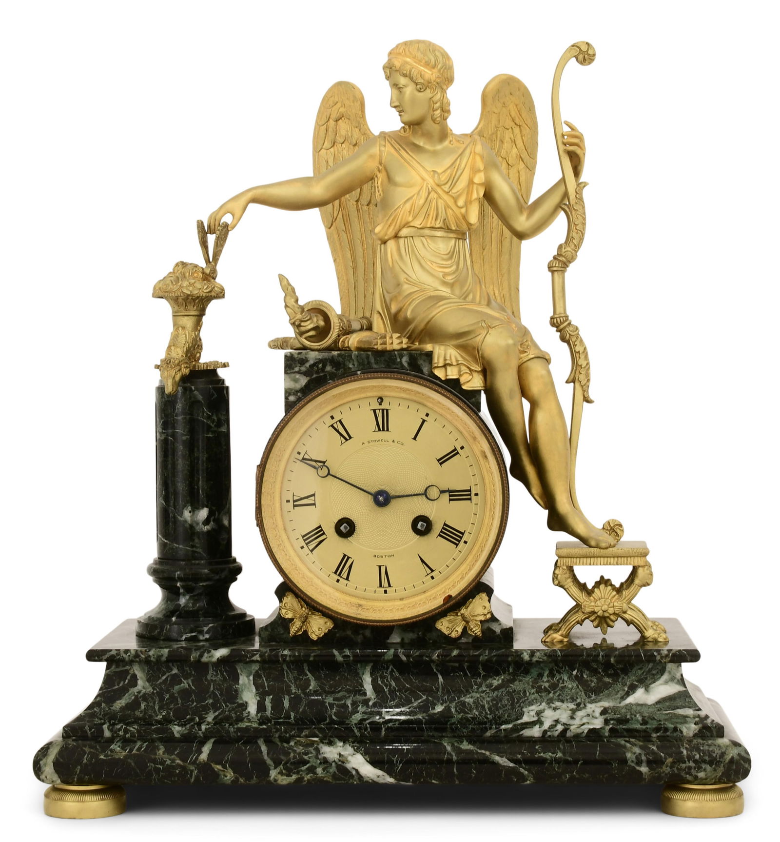 French Empire Gilt Bronze & Marble Mantel Clock with Cupid, Retailed by A. Stowell & Co., Boston: French Empire Gilt Bronze & Marble Mantel Clock with Cupid, Retailed by A. Stowell & Co., Bostonmid-19th centurythe clock surmounted by a figure of Cupid, French ebauche 8-day day time and strike spri