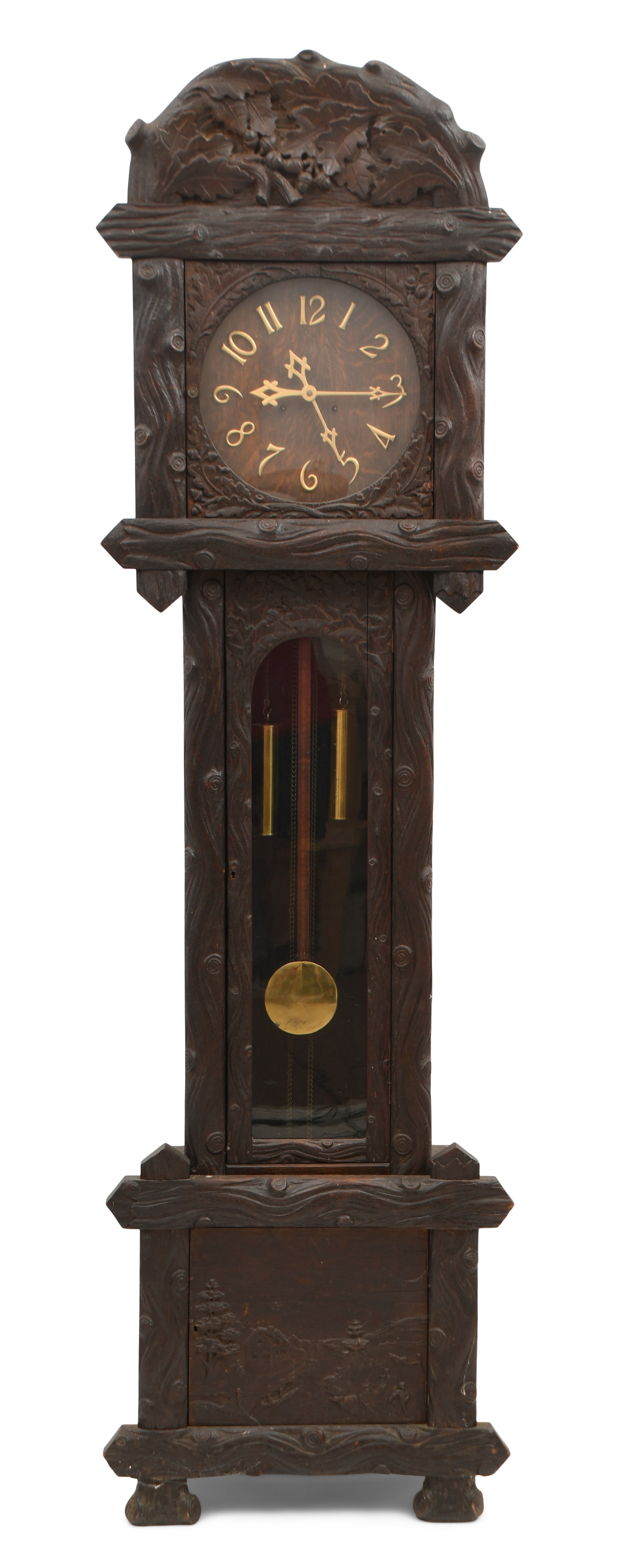 A Carved Oak Black Forest Tall Clock: A Carved Oak Black Forest Tall Clockearly 20th centurybrass 8-day weight driven time and strike movement, movement signed "Waterbury Clock Co."84 x 24 x 12 inches