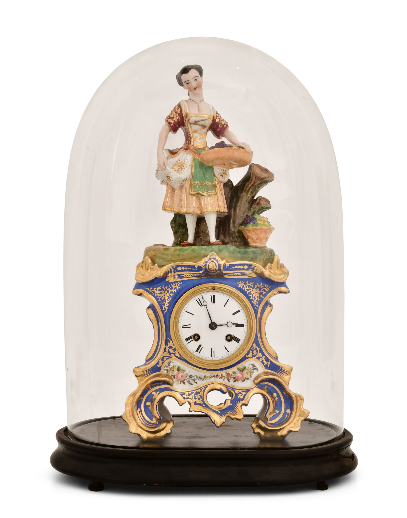 French Domed Figural Porcelain Clock with Musical Base: French Domed Figural Porcelain Clock with Musical Baseearly 19th centuryporcelain clock with a surmounted woman holding a basket of fruit, French ebauche 8-day spring driven time and strike movement w