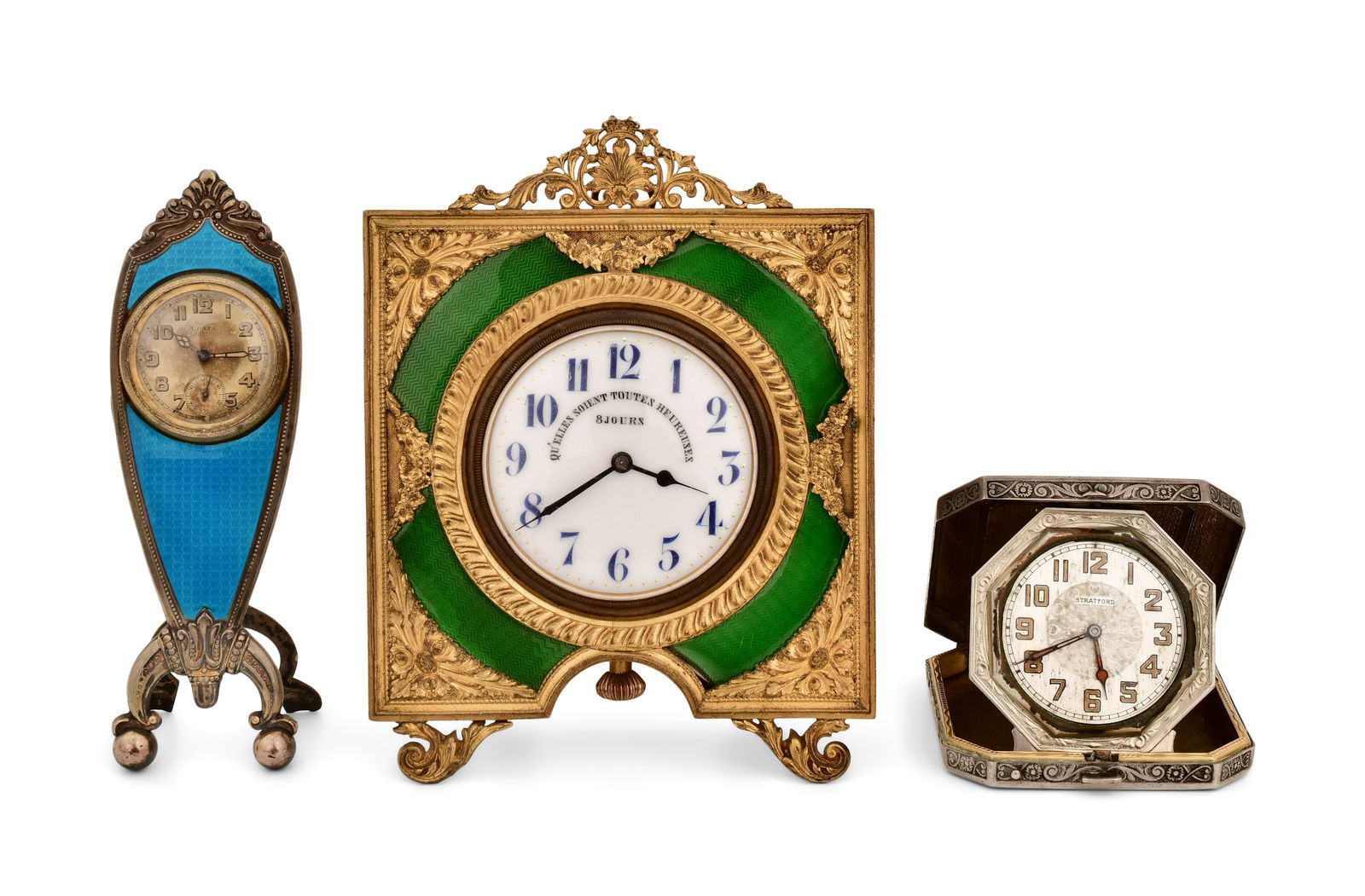Lot of Three Guilloche Enamel Desk Clocks: Lot of Three Guilloche Enamel Desk Clocksearly 20th century1. Swiss blue guilloche and sterling silver, 8-day 6-jewel time only movement, signed "Wilburg Watch Co.", very good overall, not running.2.