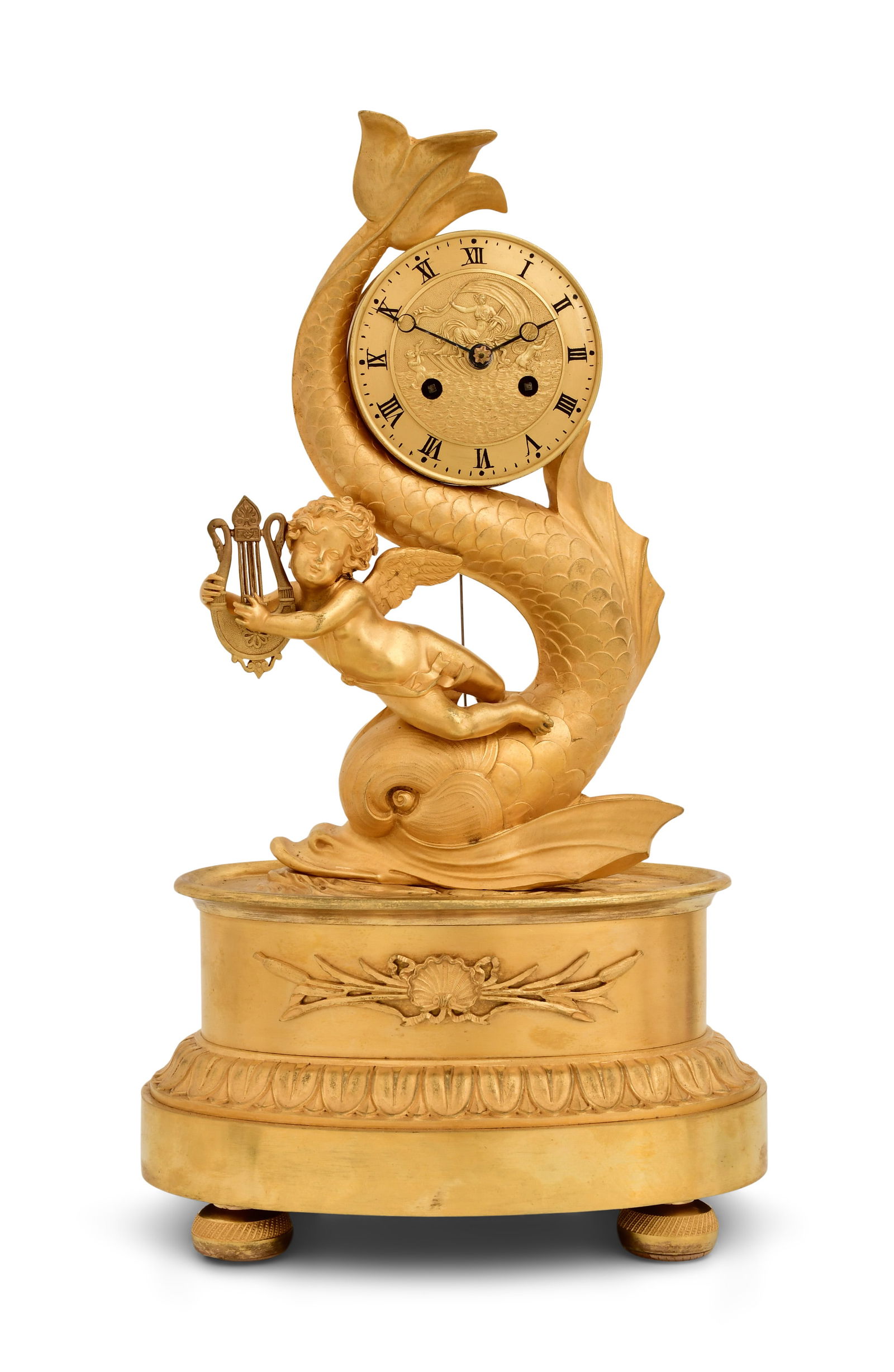 French Gilt Bronze Dolphin Mantel Clock: French Gilt Bronze Dolphin Mantel Clockearly 19th centurythe bronze dolphin and putti holding a surmounted clock, French ebauche 8-day brass spring driven time and strike movement with silk thread sus