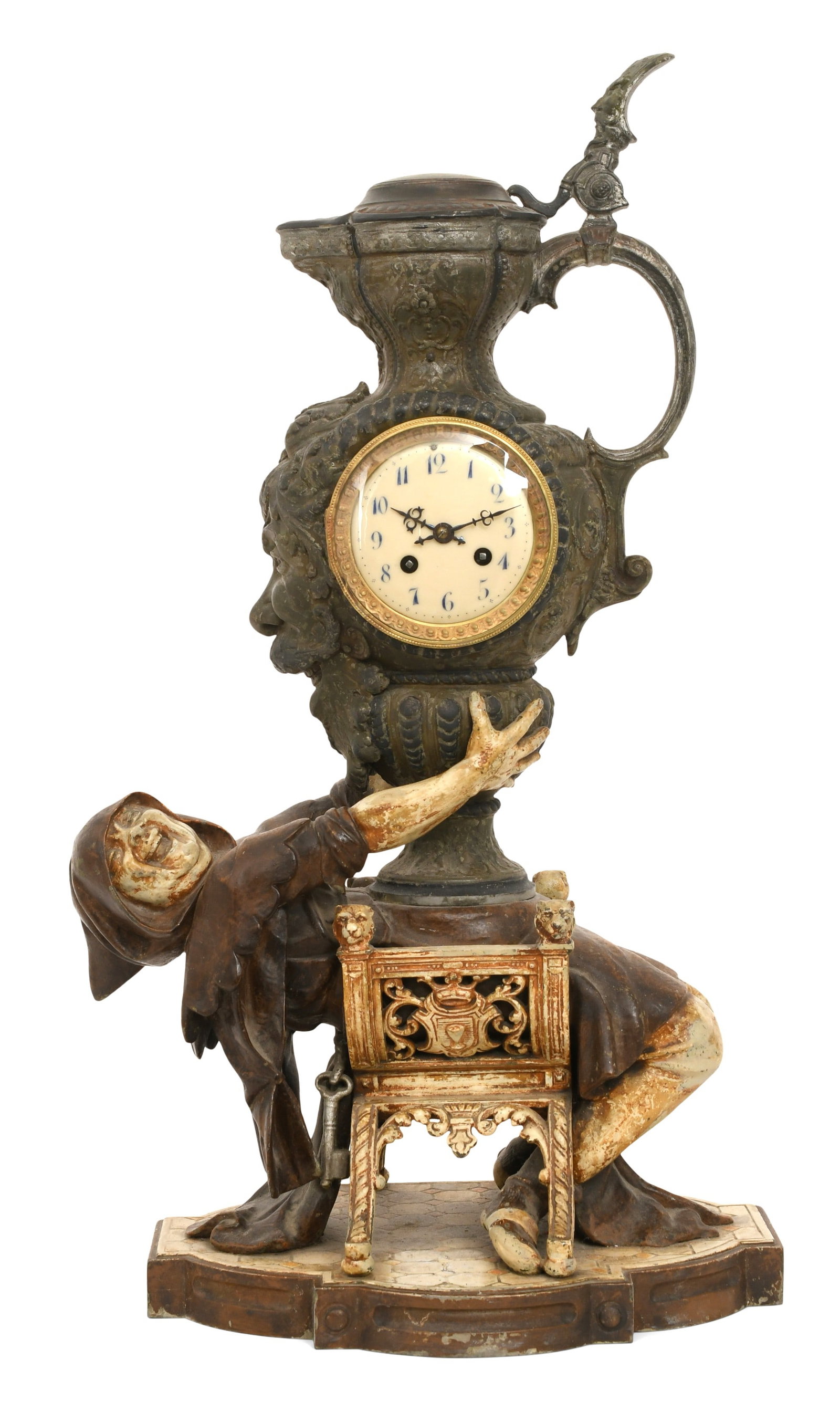 French Polychromed Metal Figural Clock: French Polychromed Metal Figural Clockcirca 1900modeled as a monk seated in chair holding a beer stein, the stein with a Bacchus head facing left and the clock facing forward, 3 1/2-inch dial with an
