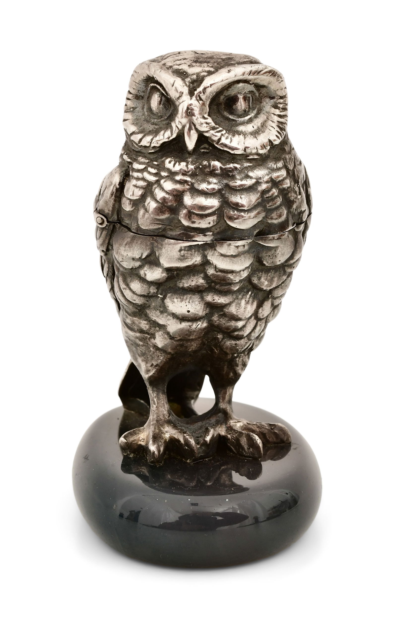 A Silver Verge Fusee Owl Desk Clock: A Silver Verge Fusee Owl Desk Clock20th century figure, 19th century movementsilvered owl surmounted on a blue marble base the head hinge dot reveal the clock, 30-hour brass verge fusee movement of Fr