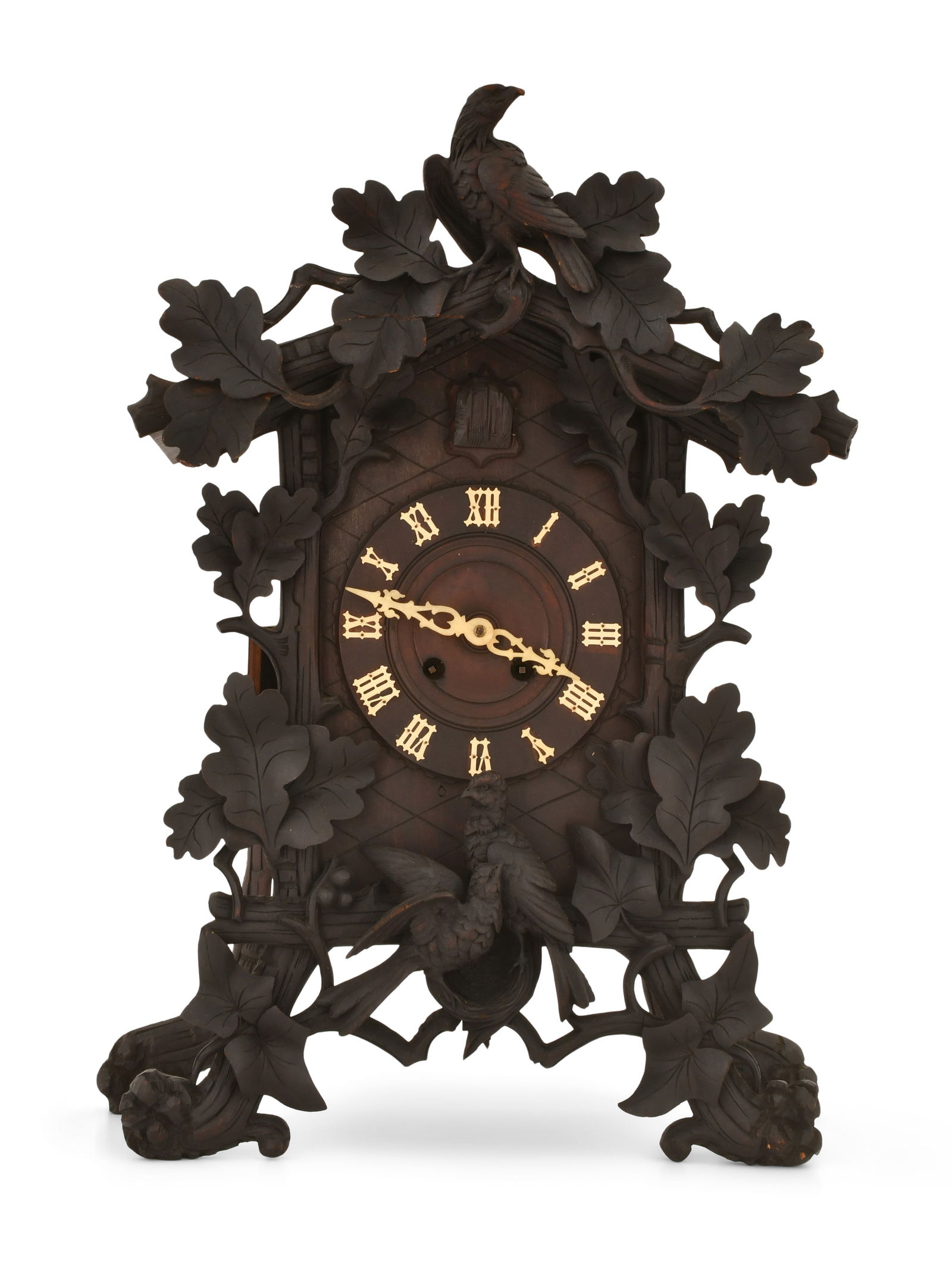 Black Forest Carved Mantel Cuckoo Clock: Black Forest Carved Mantel Cuckoo Clocklate 19th centurywith quail, leaves and branches, 8-day brass cuckoo movement is unsigned23 1/2 x 16 x 10 inches.