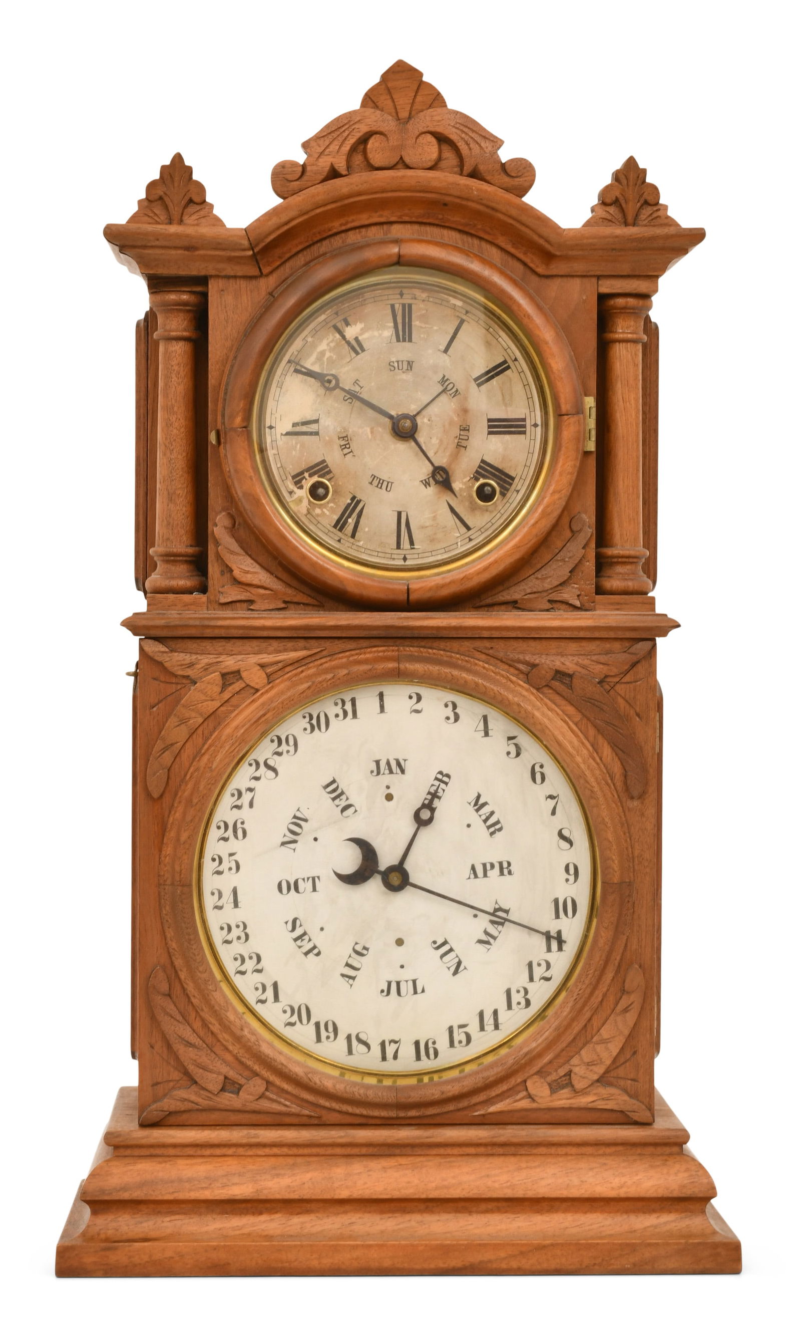 E. Ingraham & Co. Double Dial Calendar Mantel Clock: E. Ingraham & Co. Double Dial Calendar Mantel Clocklate 19th centurywalnut case with carved spandrels, brass 8-day time and strike spring driven movement with detached calendar mechanism patented by B