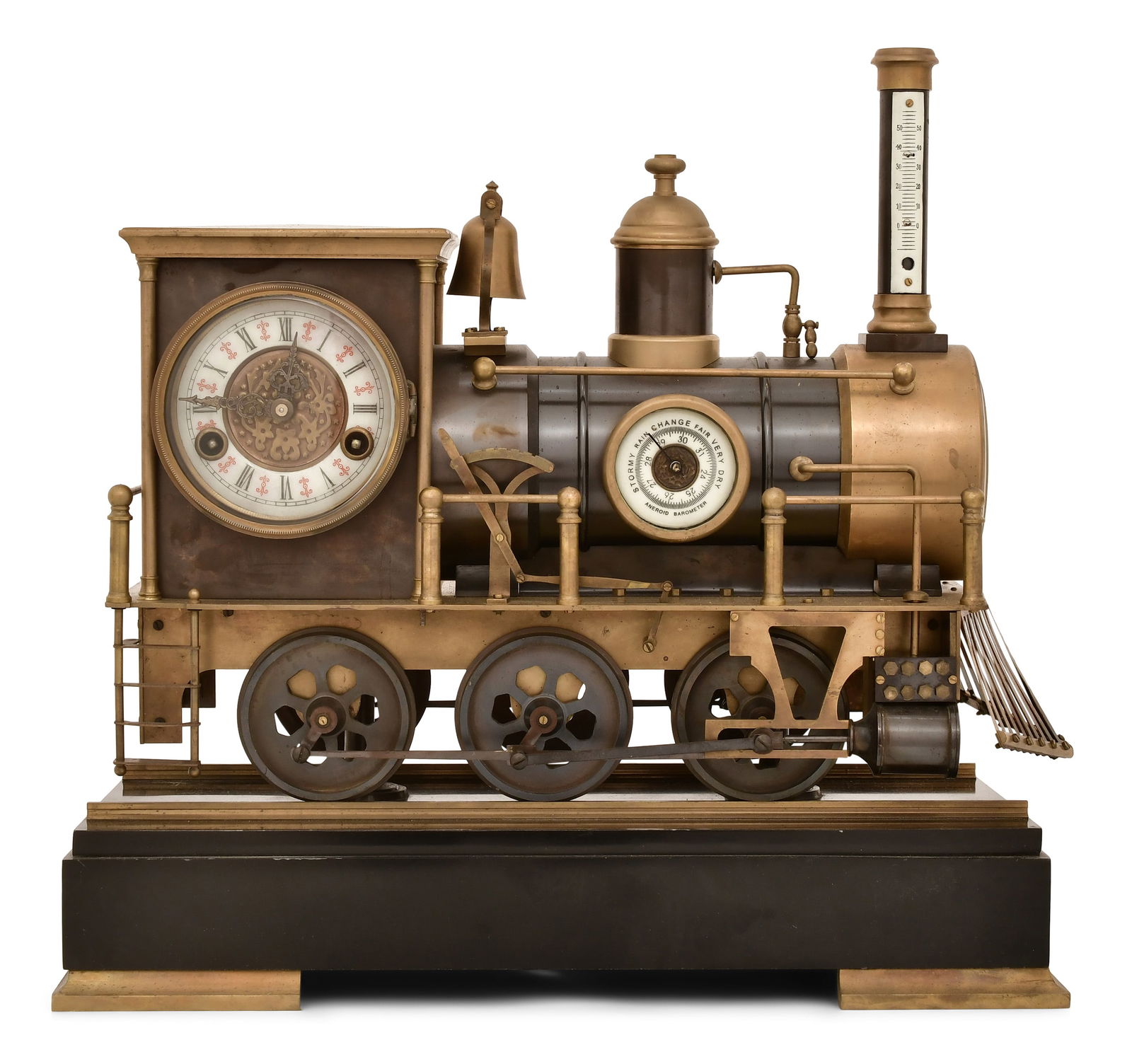 An Industrial Locomotive Train Clock: An Industrial Locomotive Train Clocklate 20th centurybrass locomotive with a clock mounted to the cab, barometer in the boiler, and a thermometer in the stack, 8-day brass spring driven time and strik