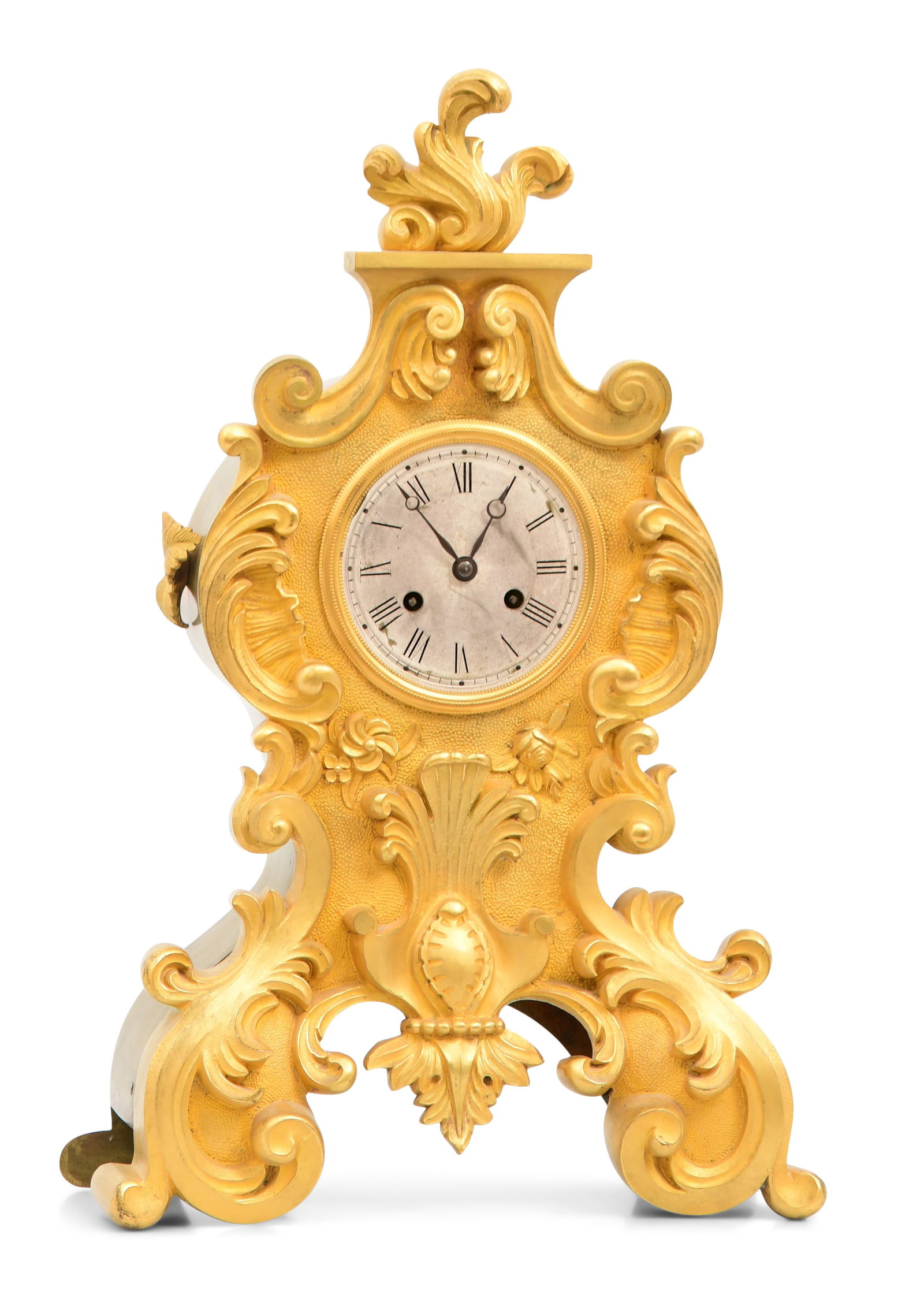 French Louis XV-Style Gilt Bronze Mantel Clock: French Louis XV-Style Gilt Bronze Mantel Clockmid-19th centurythe case with scrolling decoration and a cartouche shield, brass 8-day time and strike movement with silk thread suspension and count whee