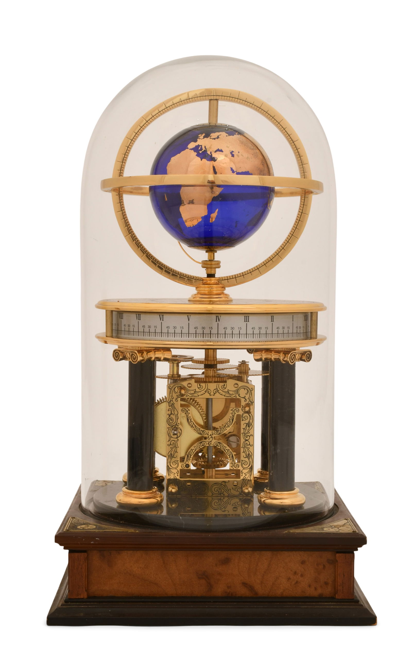 Royal Geographical Society Millennium Clock: Royal Geographical Society Millennium Clockcirca 2000walnut case with glass dome over an annular clock and central globe, 8-day brass spring driven time only German movement, inside plaque signed "Roy