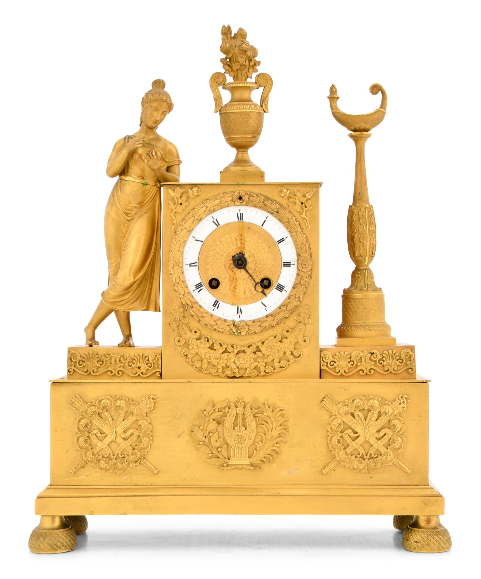 Charles X Gilt Bronze Mantel Clock: Charles X Gilt Bronze Mantel Clockcirca 1830the clock with a maiden, urn and foliate decoration, porcelain chapter ring with Roman hour numerals, 8-day time and strike movement with silk thread suspen