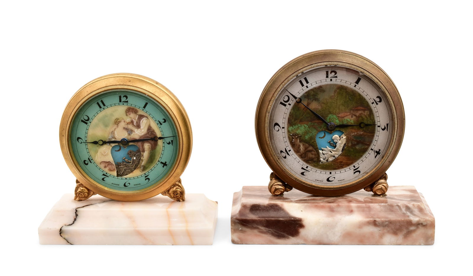 Two Swiss "Le Petit Forgeron" (The Small Blacksmith) Automaton Desk Clocks: Two Swiss "Le Petit Forgeron" (The Small Blacksmith) Automaton Desk Clocksearly 20th centurybrass framed clocks mounted to a marble base with painted dials and automaton angels using an anvil, 8-day t