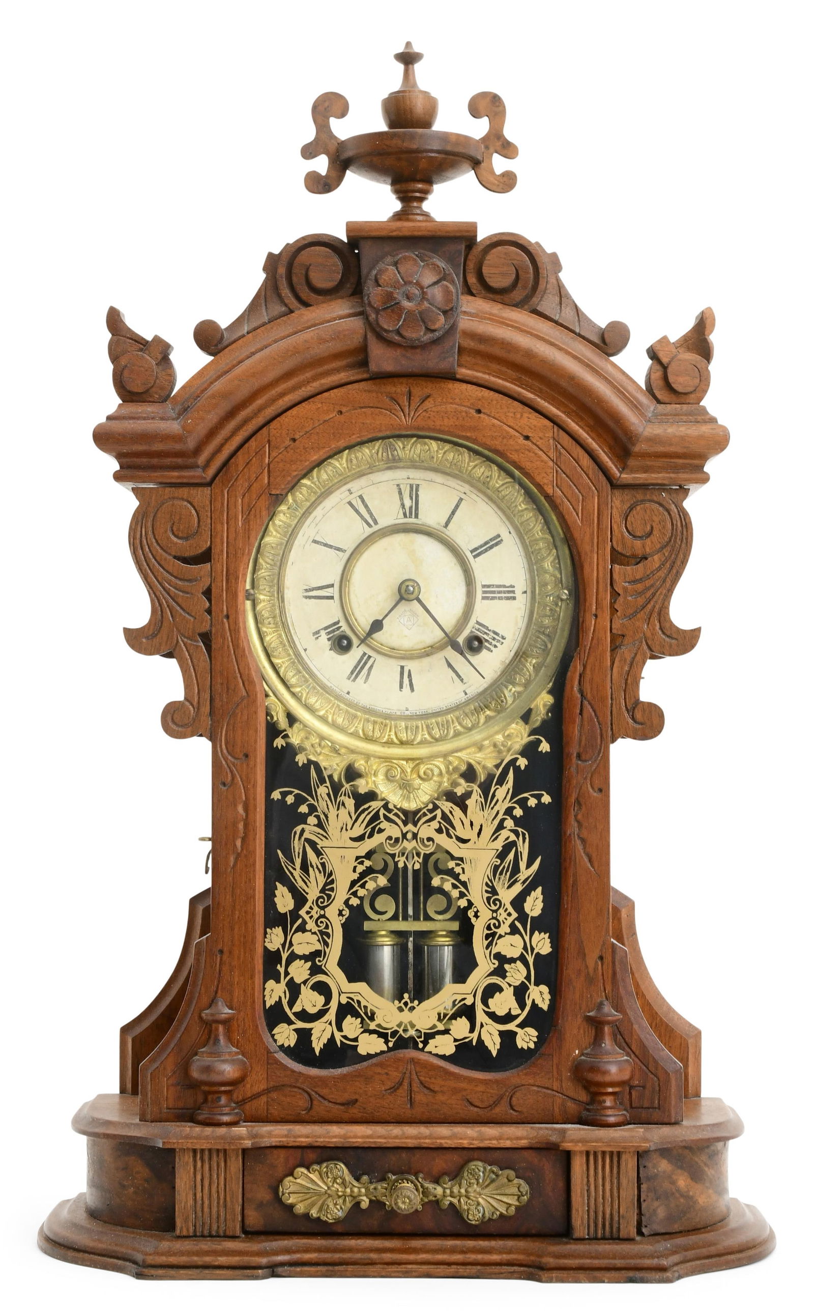 Ansonia Clock Co. "Monarch" Shelf Clock: Ansonia Clock Co. "Monarch" Shelf Clockcirca 1900carved walnut case, 8-day time and strike spring-driven movement, signed on the label, dial, and movement24 1/2 x 15 1/2 x 5 3/4 inches