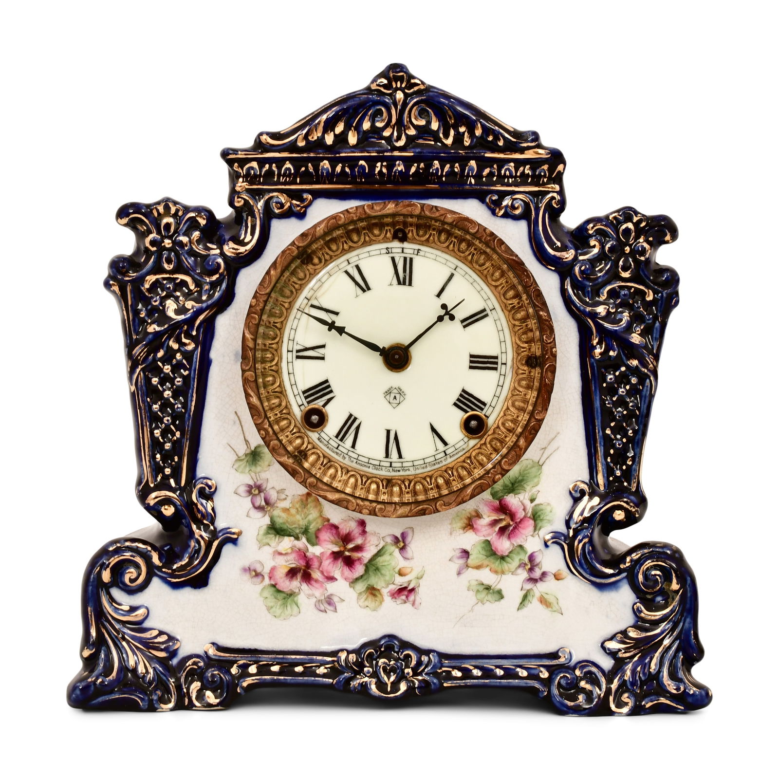 Ansonia Clock Co. "Whig" Porcelain Mantel Clock: Ansonia Clock Co. "Whig" Porcelain Mantel Clock late 19th century porcelain case decorated with flowers brass 8-day time and strike movement, signed on the dial and movement, case marked "Whig" 11 x