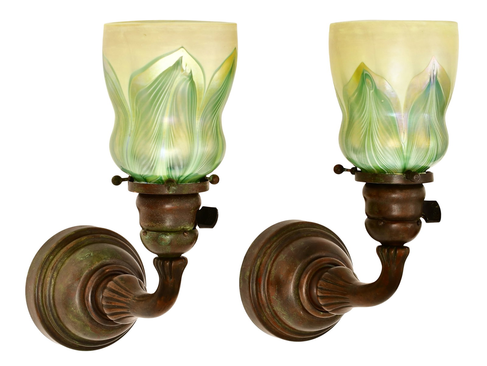 Tiffany Studios, A Pair of "Pulled Feather" Sconces: Tiffany Studios A Pair of "Pulled Feather" Sconces circa 1905 favrile glass, patinated bronze each shade engraved "L.C.T." 10 x 4 x 7 1/2 inches Provenance: Private Collection, Arizona Important