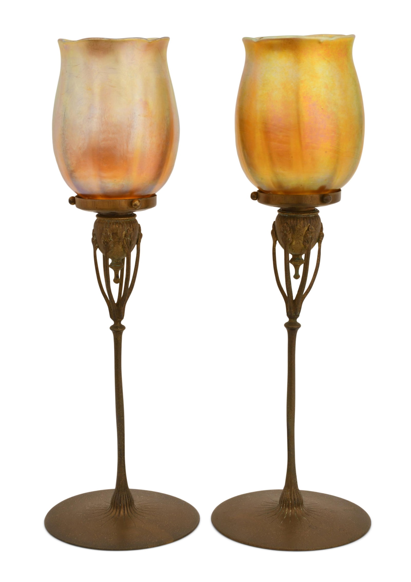 Tiffany Studios, Pair of Candlesticks, Model 1210: Tiffany Studios Pair of Candlesticks, Model 1210 circa 1910 favrile glass, gilt bronze each shade engraved "L.C.T." 15 x 5 inches Provenance: Property from an Important Northeast Collection Other N