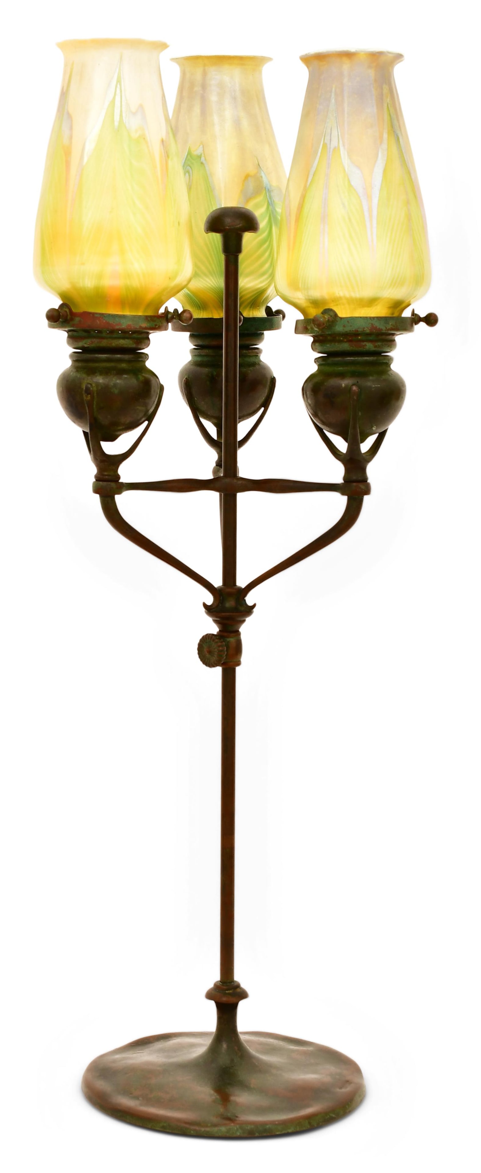 Tiffany Studios Three-Light Candlestick with "Pulled Feather" Shades: Tiffany Studios Three-Light Candlestick with "Pulled Feather" Shades circa 1910 favrile glass, patinated bronze each shade engraved "L.C.T." base impressed "Tiffany Studios, New York" 21 1/2 x 8