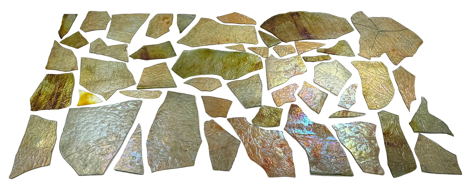 Tiffany Studios, Collection of 49 Decorated Favrile Glass Fragments, Design Attributed to Agnes: Tiffany Studios Collection of 49 Decorated Fragments, Design Attributed to Agnes Northrop circa 1905 favrile glass 14 x 7 inches A few of the fragments bear botanical imprints similar to some of