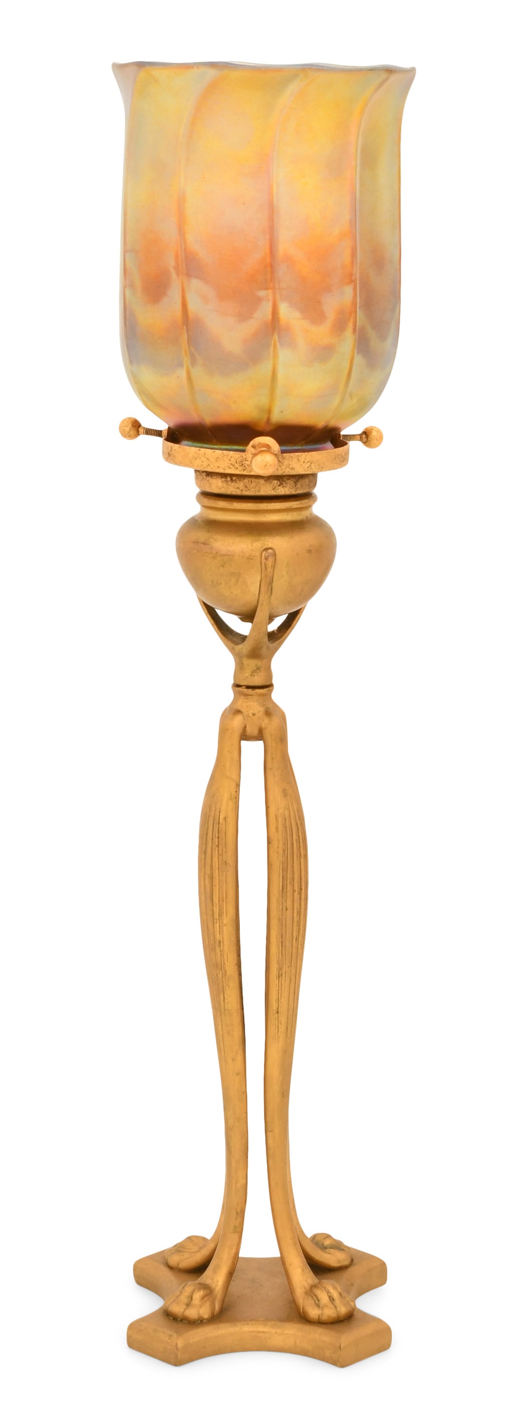 Tiffany Studios "Cat's Paw" Candlestick with Reactive Favrile Glass Shade: Tiffany Studios "Cat's Paw" Candlestick with Reactive Shade circa 1910 favrile glass, gilt bronze shade engraved "L.C.T. Favrile" base impressed "Tiffany Studios, New York, 1201" 16 1/2 x 4 inches