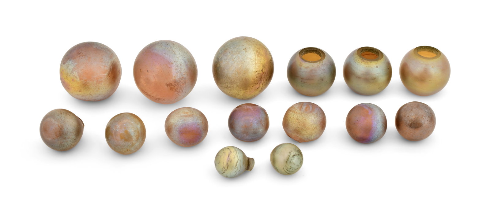 Tiffany Studios, Collection of 15 Favrile Glass Balls: Tiffany Studios Collection of 15 Balls early 20th century favrile glass 1 1/4 in. diameter (largest) Provenance: Private Collection, New Jersey Other Notes: Fontaine's Auction Gallery can arrange