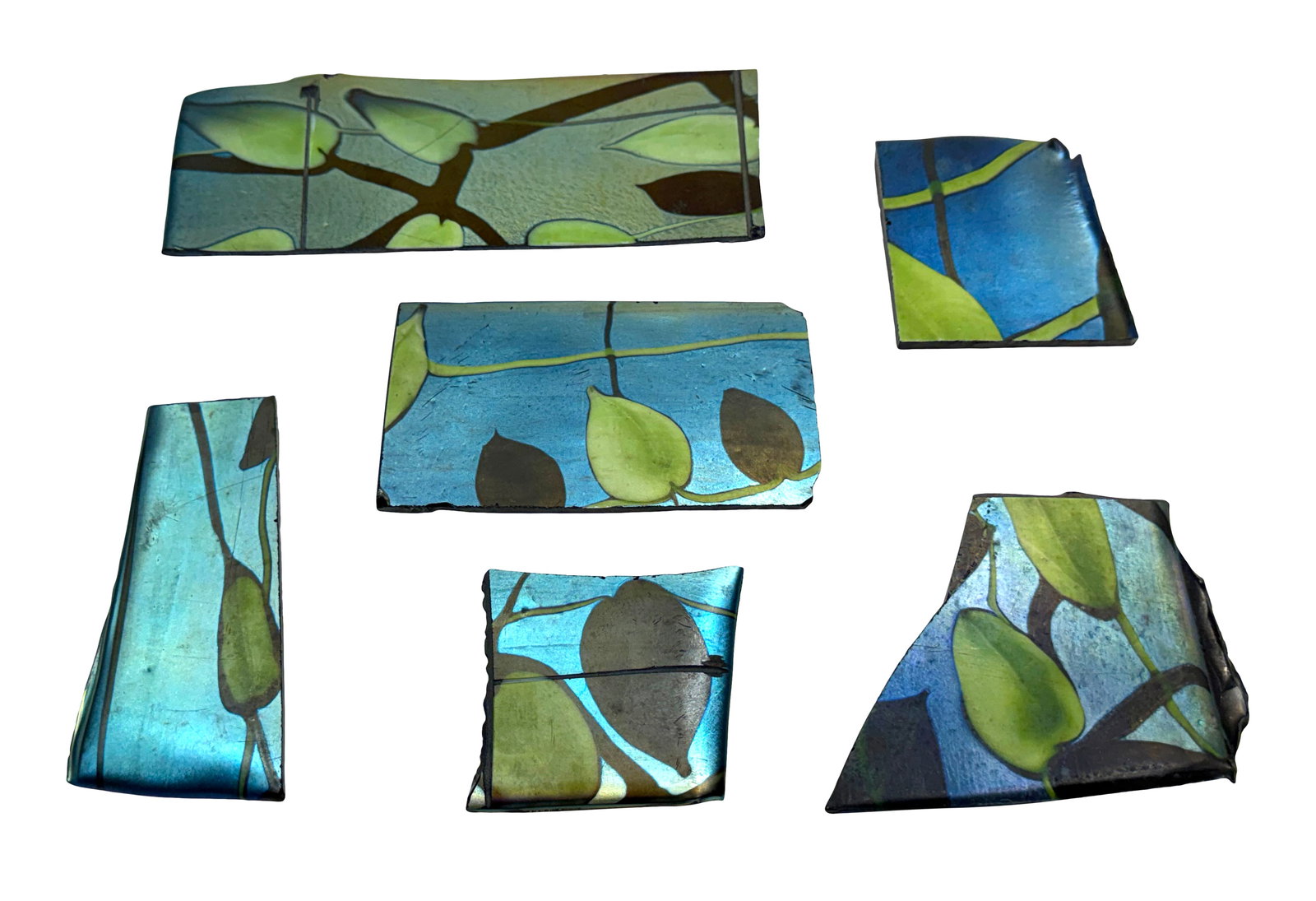 Tiffany Studios, Collection of Six Favrile Glass Fragments, Created for Louis Comfort Tiffany's Pear: Tiffany Studios Collection of Six Fragments, Created for Louis Comfort Tiffany's Pear Tree Panel, Daffodil Terrace, Laurelton Hall circa 1915 favrile glass 8 1/2 x 3 1/4 inches Literature: Morse Museu