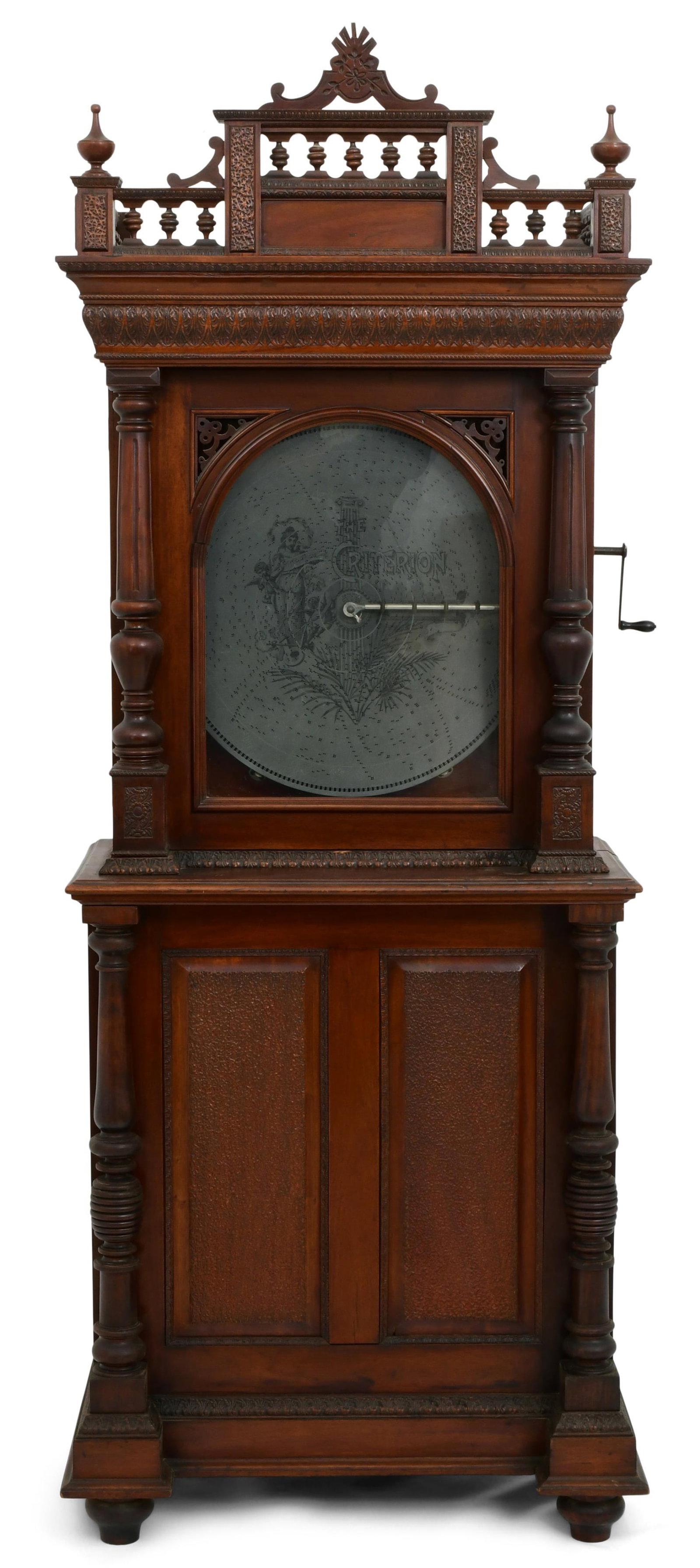 F.G. Otto & Sons "Criterion" Floor Standing Music Box: F.G. Otto & Sons (American, 19th/20th Century) "Criterion" Floor Standing Music Box circa 1905 mahogany case with 25 discs 80 x 31 x 18 1/2 inches 20 1/2 in. diameter (discs) Provenance: Prope