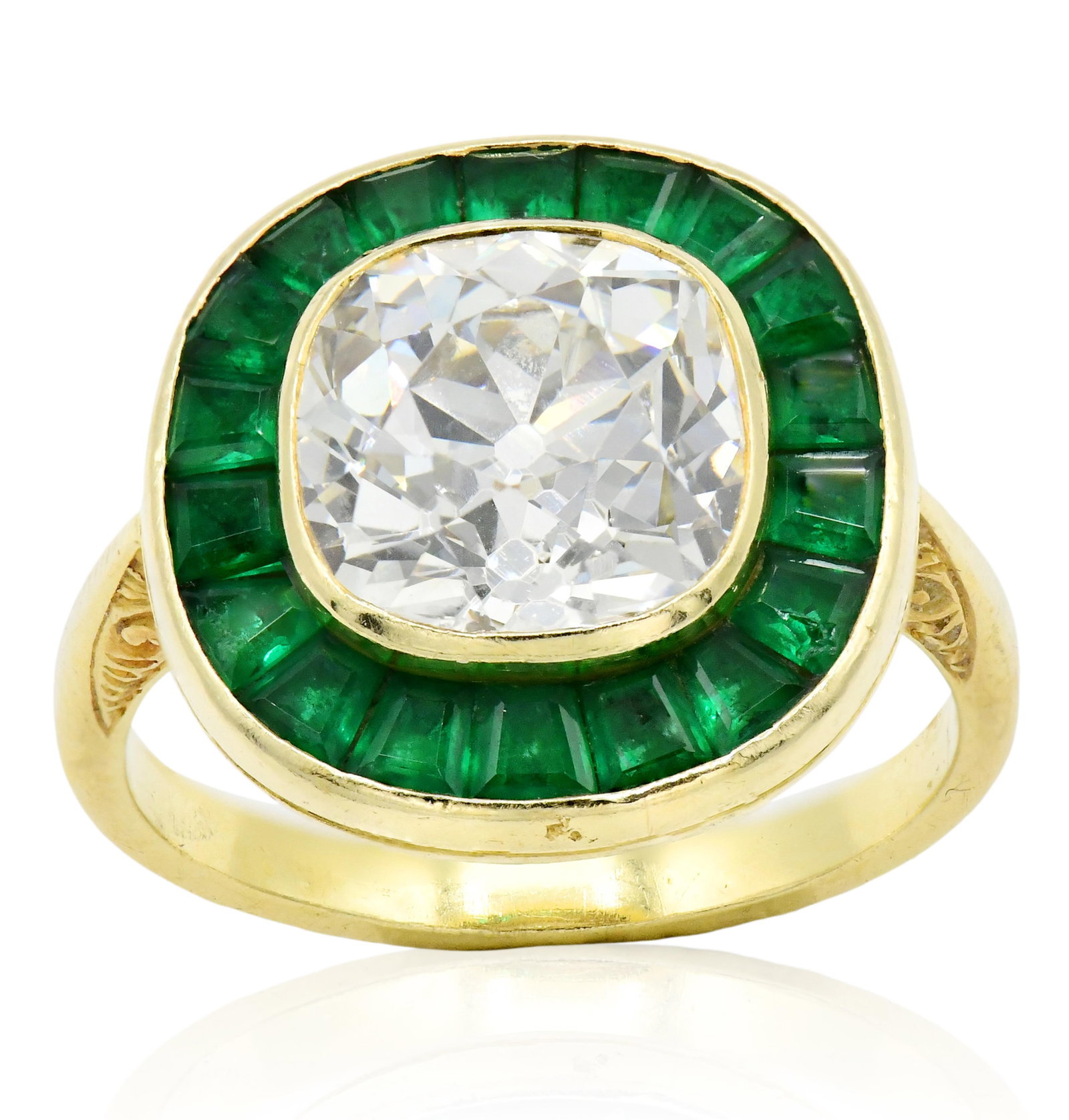 18K Yellow Gold, 3.31 Carat Diamond & Emerald Ring: 18K Yellow Gold, 3.31 Carat Diamond & Emerald Ring • featuring a 3.31 carat Old Mine cut diamond with J color, VS2 clarity and no fluorescence • bordered by trapezoid emeralds weighing a
