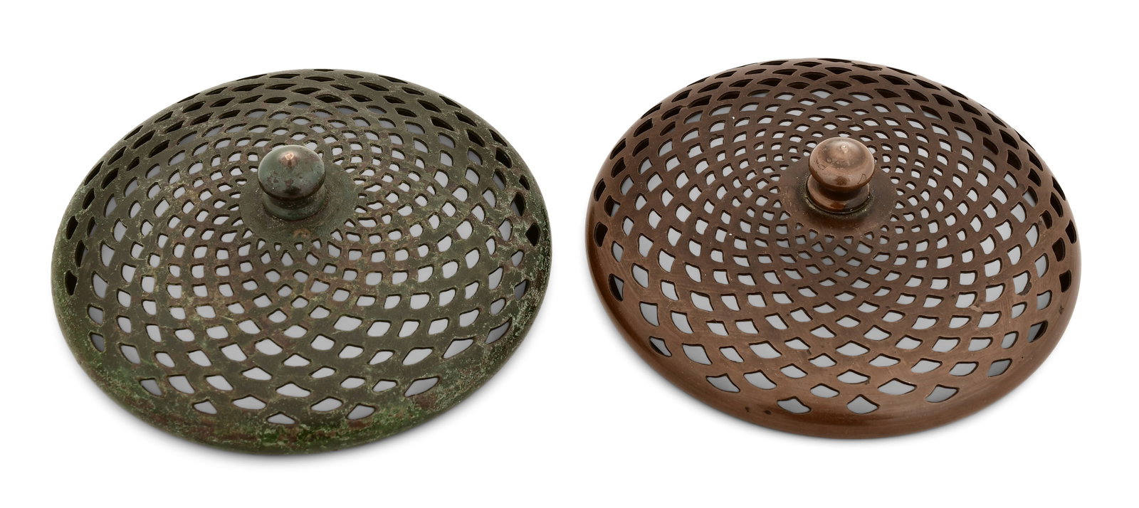 Tiffany Studios, Two Heat Caps: Tiffany Studios Two Heat Caps circa 1910 patinated bronze 4 3/4 in. diameter Provenance: Property from an Important Northeast Collection Other Notes: Fontaine's Auction Gallery can arrange shipping