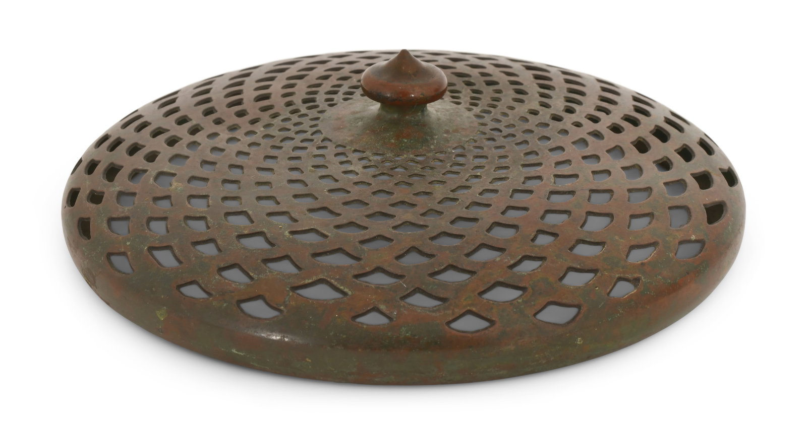 Tiffany Studios, A Large Heat Cap: Tiffany Studios A Large Heat Cap circa 1910 patinated bronze 5 3/4 in. diameter Provenance: Important Private Collection Other Notes: Fontaine's Auction Gallery can arrange shipping for this item