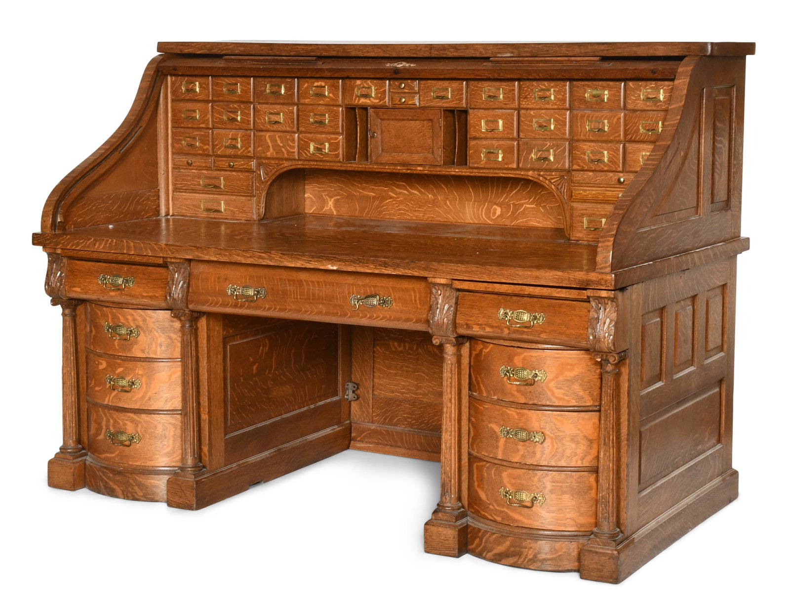 Gunn Furniture Co. "The Gunn Desk" Oak Roll Top Desk: Gunn Furniture Co. (Grand Rapids, MI, 1893-1953) "The Gunn Desk" Roll Top Desk circa 1900 oak signed on the lock plate "The Gunn Desk, Grand Rapids, Mich" 51 x 72 x 38 inches Provenance: Private
