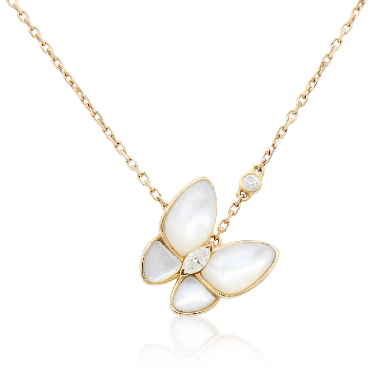 Attributed to Van Cleef & Arpels 18K Yellow Gold, Diamond & Mother Of Pearl Butterfly Necklace: Attributed to Van Cleef & Arpels 18K Yellow Gold, Diamond & Mother Of Pearl Butterfly Necklace • set with a 0.11 carat marquise cut diamond • the chain set with a 0.04 carat round brillian