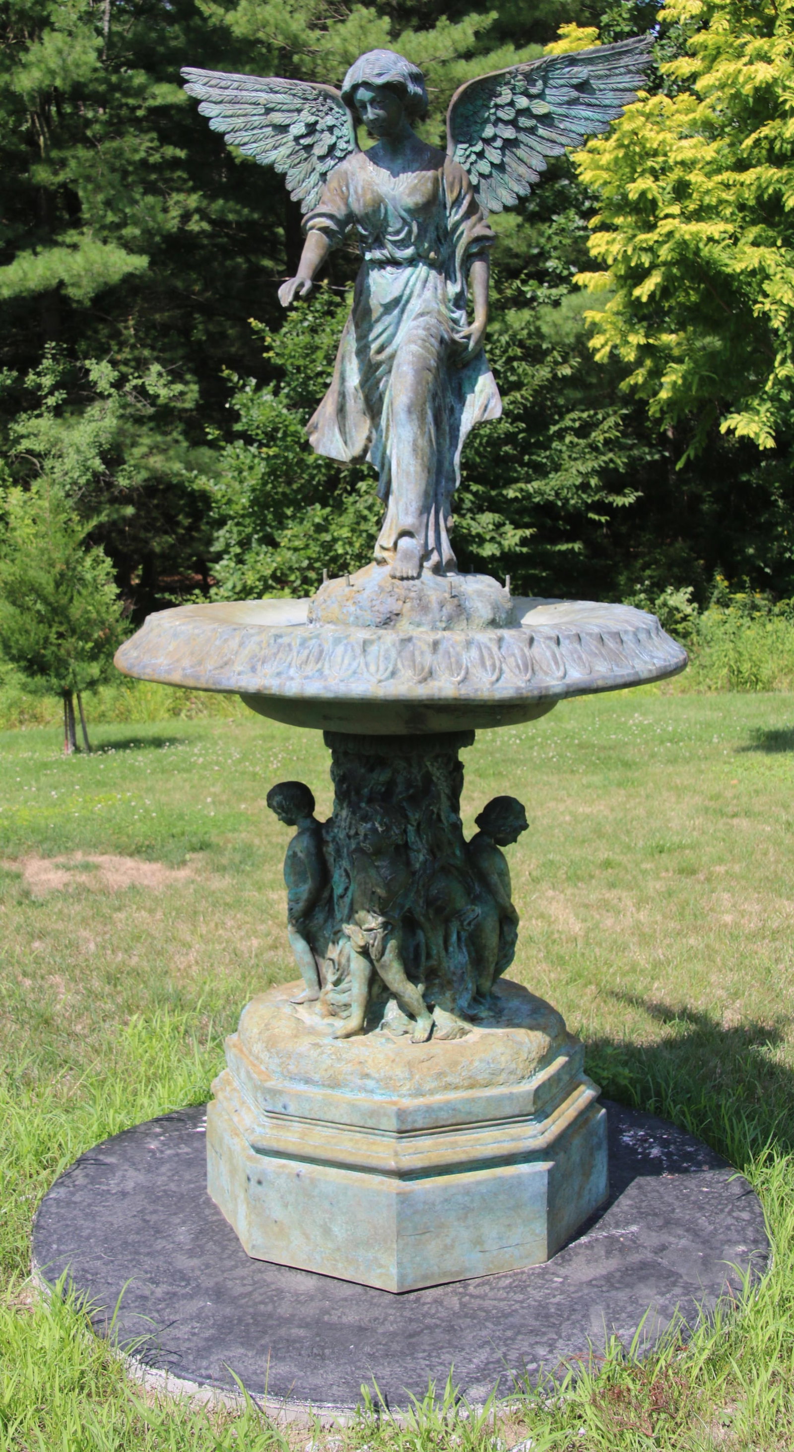 After Emile Louis Picault (French, 1833-1915), A Large Bronze Fountain with Winged Maiden & Putti: After Emile Louis Picault (French, 1833-1915), A Large Bronze Fountain with Winged Maiden & Putti 20th century the winged maiden above a bowl and four standing putti, signed with spurious signature "P