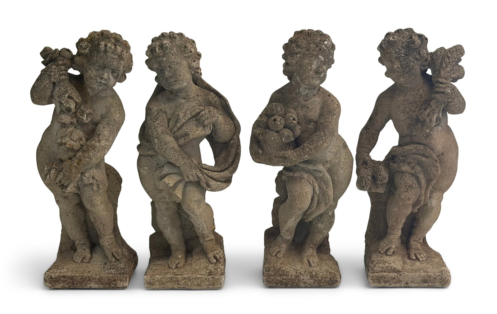 A Set of Four American Cast Stone Four Seasons Statues: A Set of Four American Cast Stone Four Seasons Statues 19th century 26 x 9 x 9 inches Provenance: Private Collection, Pennsylvania