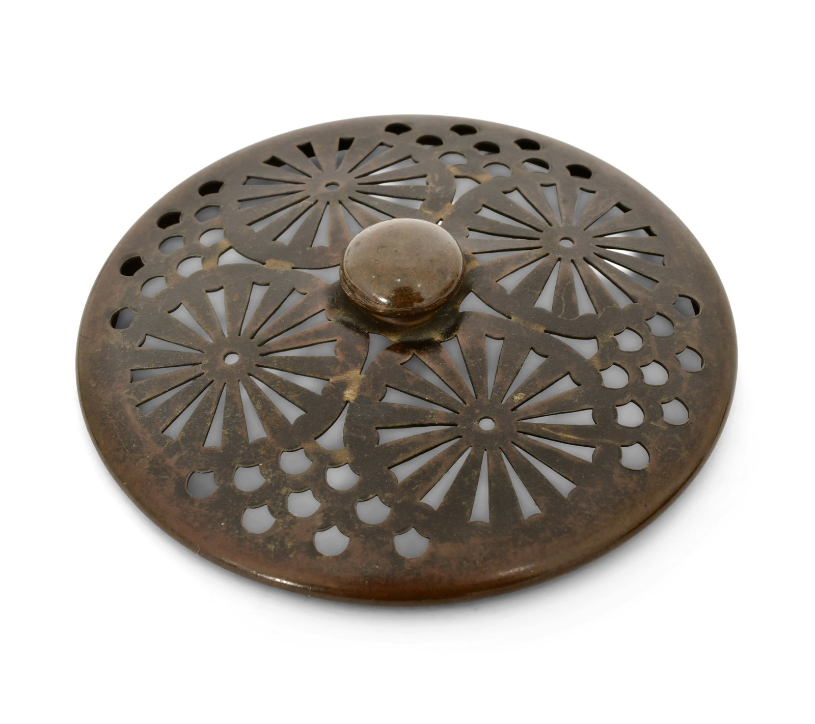 Tiffany Studios, A Rare "Pinwheel" Heat Cap: Tiffany Studios A Rare "Pinwheel" Heat Cap circa 1910 patinated bronze 4 3/4 in. diameter Provenance: Property from an Important Northeast Collection Other Notes: Fontaine's Auction Gallery can