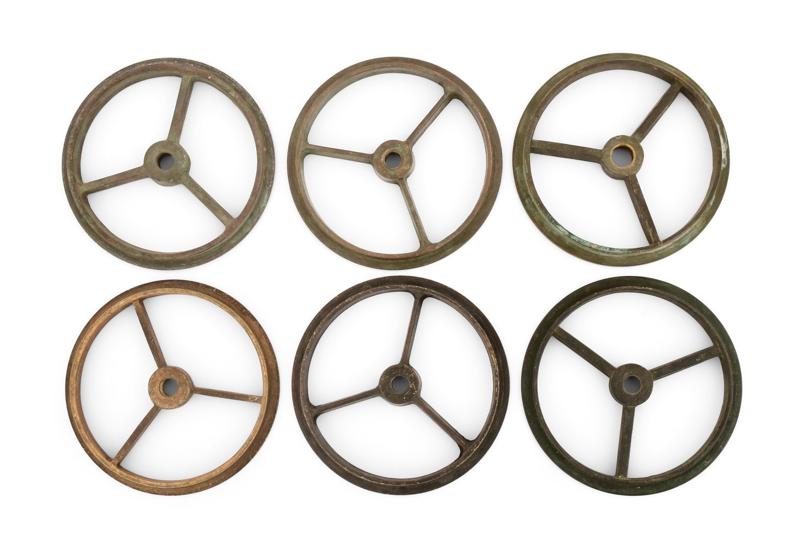 Tiffany Studios, Six Wheels: Tiffany Studios Six Wheels early 20th century bronze 4 in. diameter Provenance: Property from an Important Northeast Collection Other Notes: Fontaine's Auction Gallery can arrange shipping for this