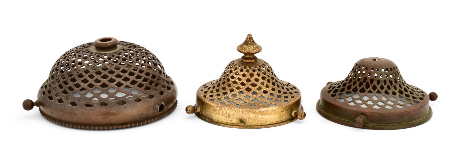 Tiffany Studios, Three Heat Caps: Tiffany Studios Three Heat Caps early 20th century patinated bronze 4 1/2 in. diameter (largest) Provenance: Property from an Important Northeast Collection Other Notes: Fontaine's Auction Gallery