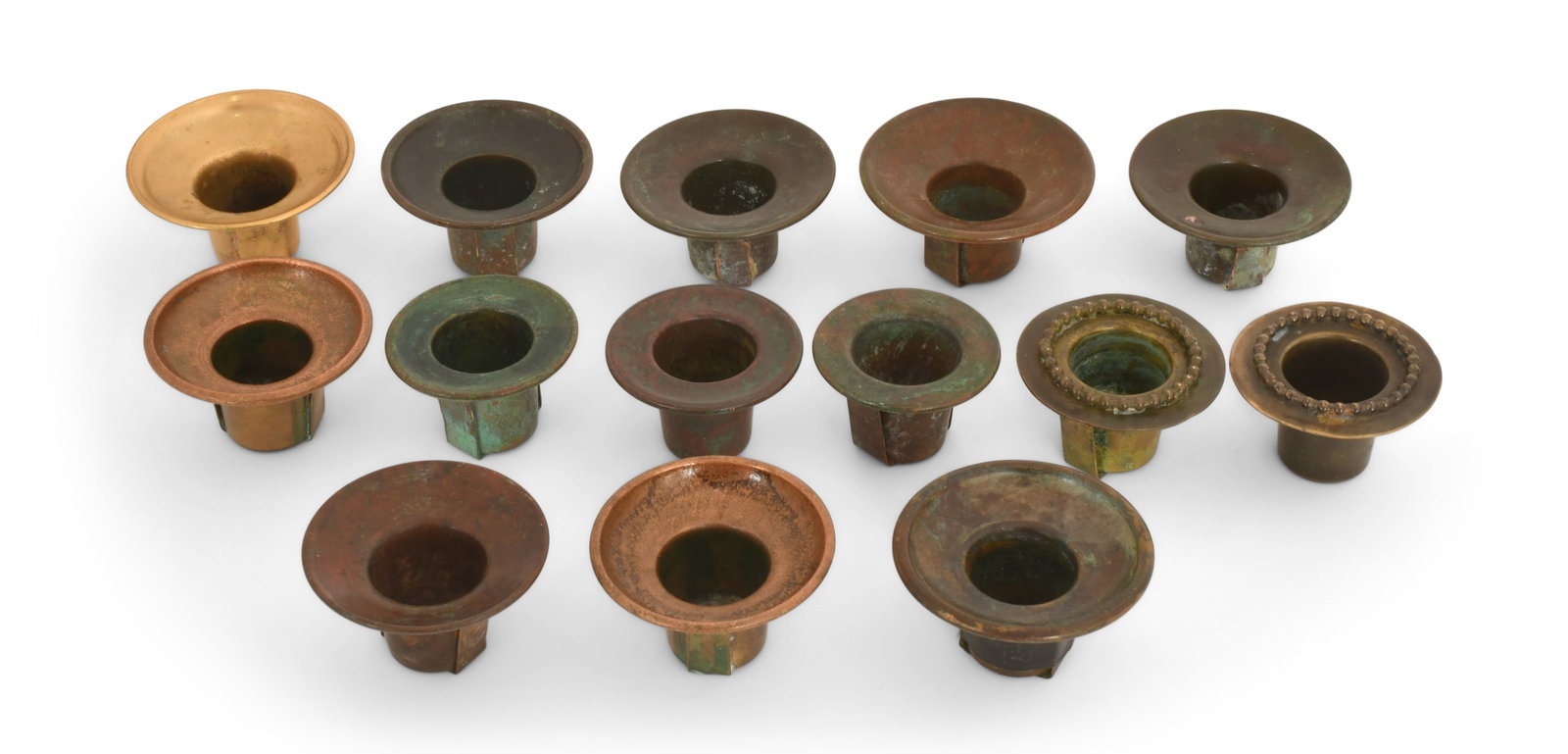 Tiffany Studios, Group of 14 Bobeches: Tiffany Studios Group of 14 Bobeches early 20th century bronze 1 x 2 inches Provenance: Private Collection, Ohio Other Notes: Fontaine's Auction Gallery can arrange shipping for this item (USA only).