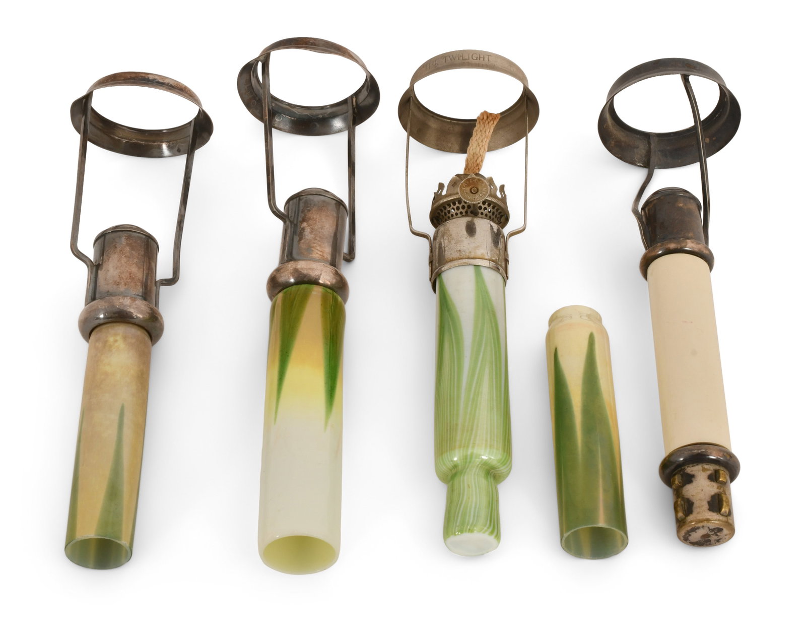 Tiffany Studios Candle Lamp Inserts: Tiffany Studios Candle Lamp Inserts early 20th century favrile glass, bronze 8 x 2 1/2 inches Provenance: Private Collection, Ohio Other Notes: Fontaine's Auction Gallery can arrange shipping for