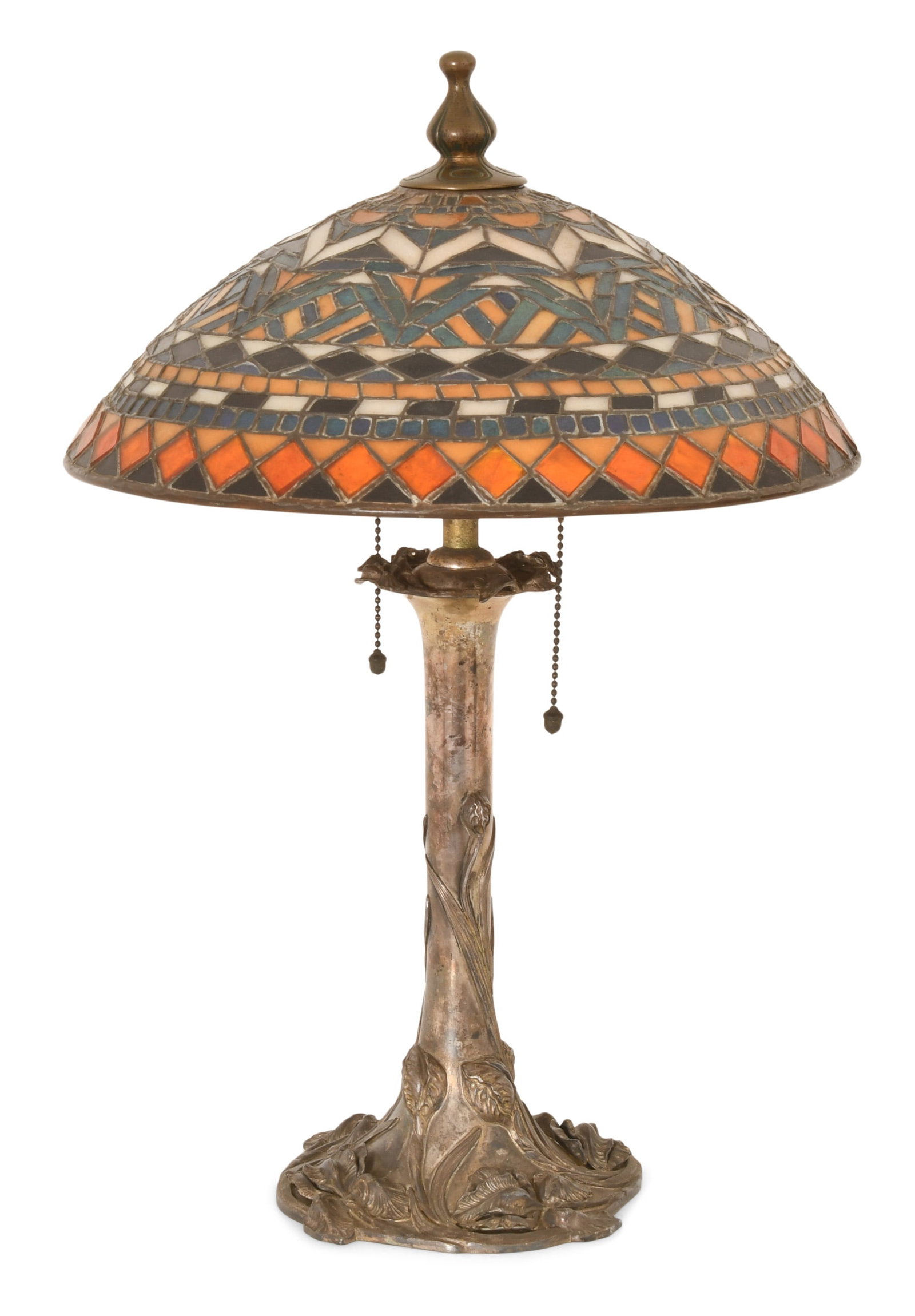 American Leaded Glass "Aztec" Table Lamp: American Leaded Glass "Aztec" Table Lamp early 20th century base marked "M.B. Co., 101, U.S.A." 20 1/2 x 13 1/2 inches Provenance: Property from an Important Northeast Collection