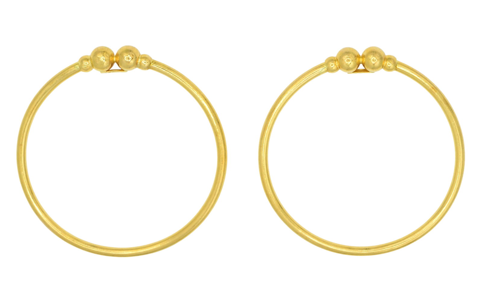 Two 14K Yellow Gold Bangle Bracelets: Two 14K Yellow Gold Bangle Bracelets • 7 1/4 (internal circumference) • 2 5/8 x 2 1/2 x 1/4 inches • 17.6 dwt (total lot weight) Provenance: Private Collection, Massachusetts Other N