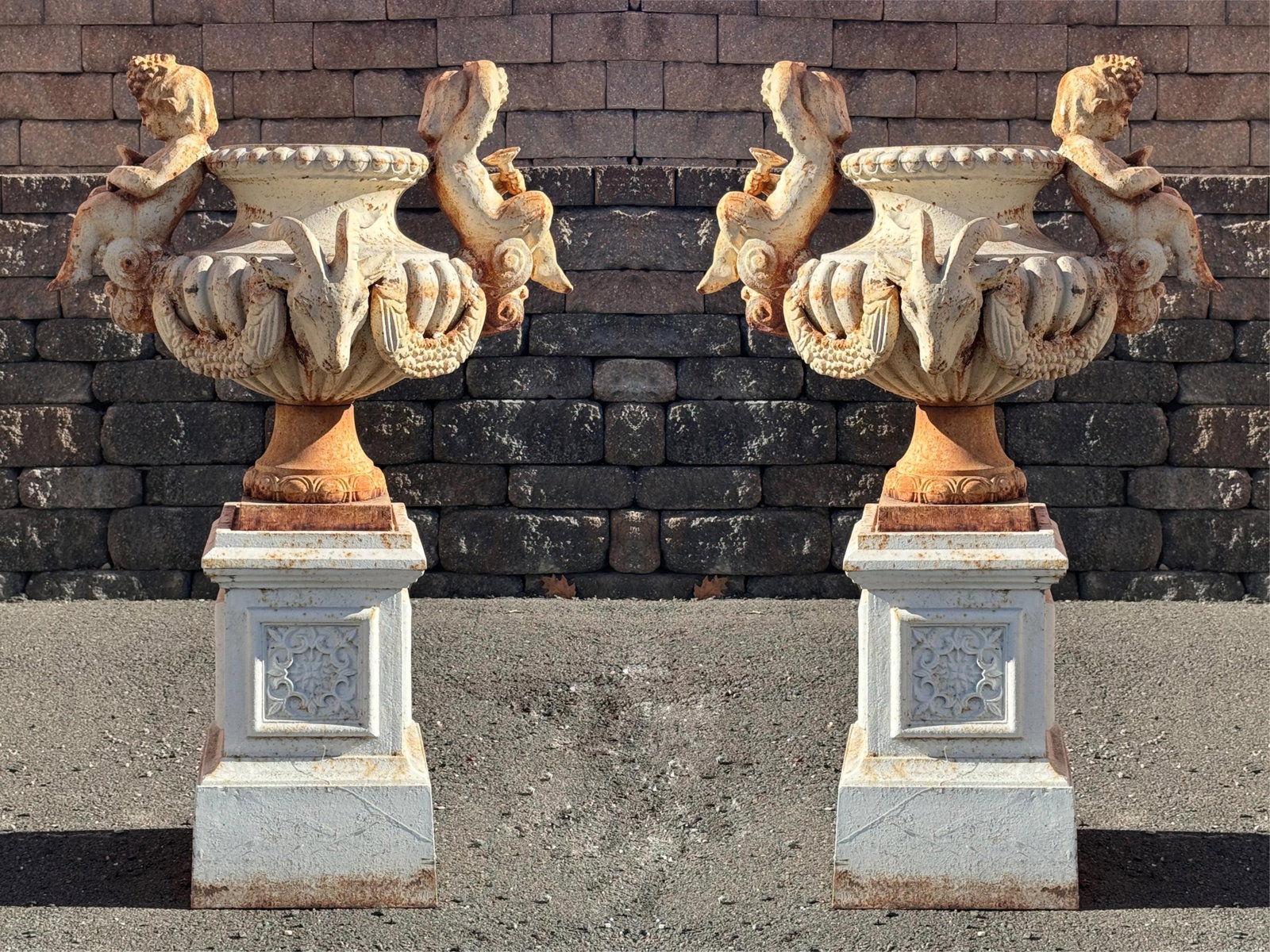A Pair of American Cast Iron Garden Urns: A Pair of American Cast Iron Garden Urns 20th century 43 x 30 x 24 inches Provenance: Private Collection, Utica, New York